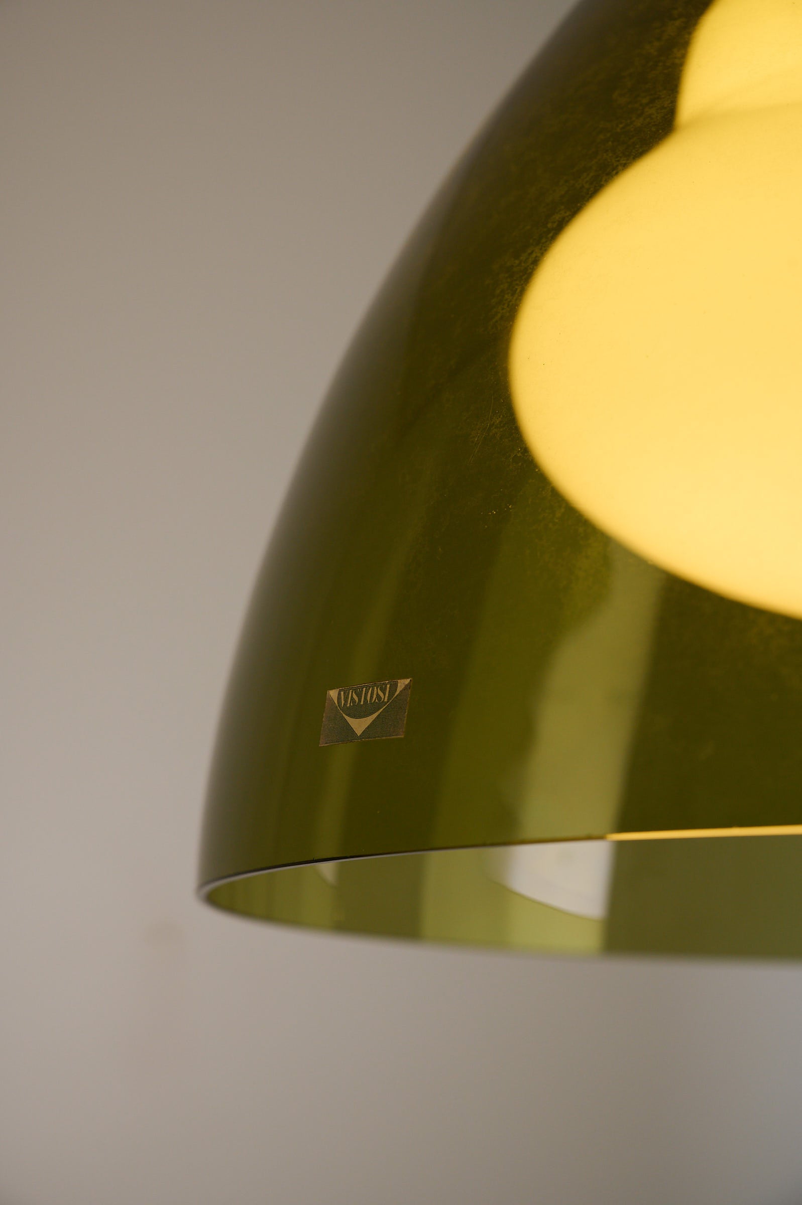 Close-up of Space Age Blown Glass Pendant Lamp by Vistosi, Italy, 1970s with olive green shade and Vistosi label.