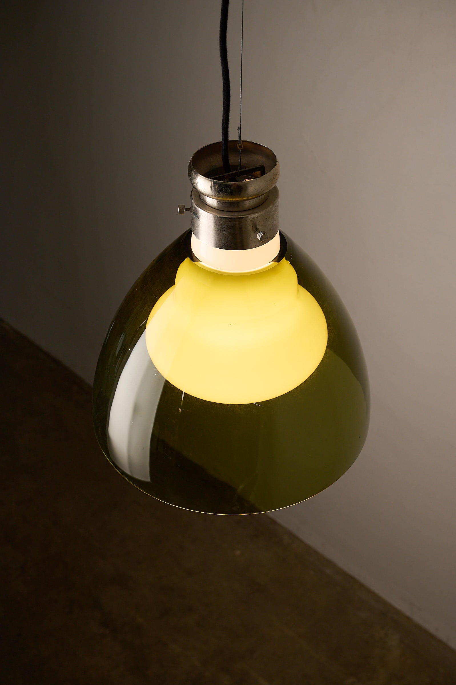 Space Age Blown Glass Pendant Lamp by Vistosi, Italy, 1970s with olive green glass shade and white opaline core.