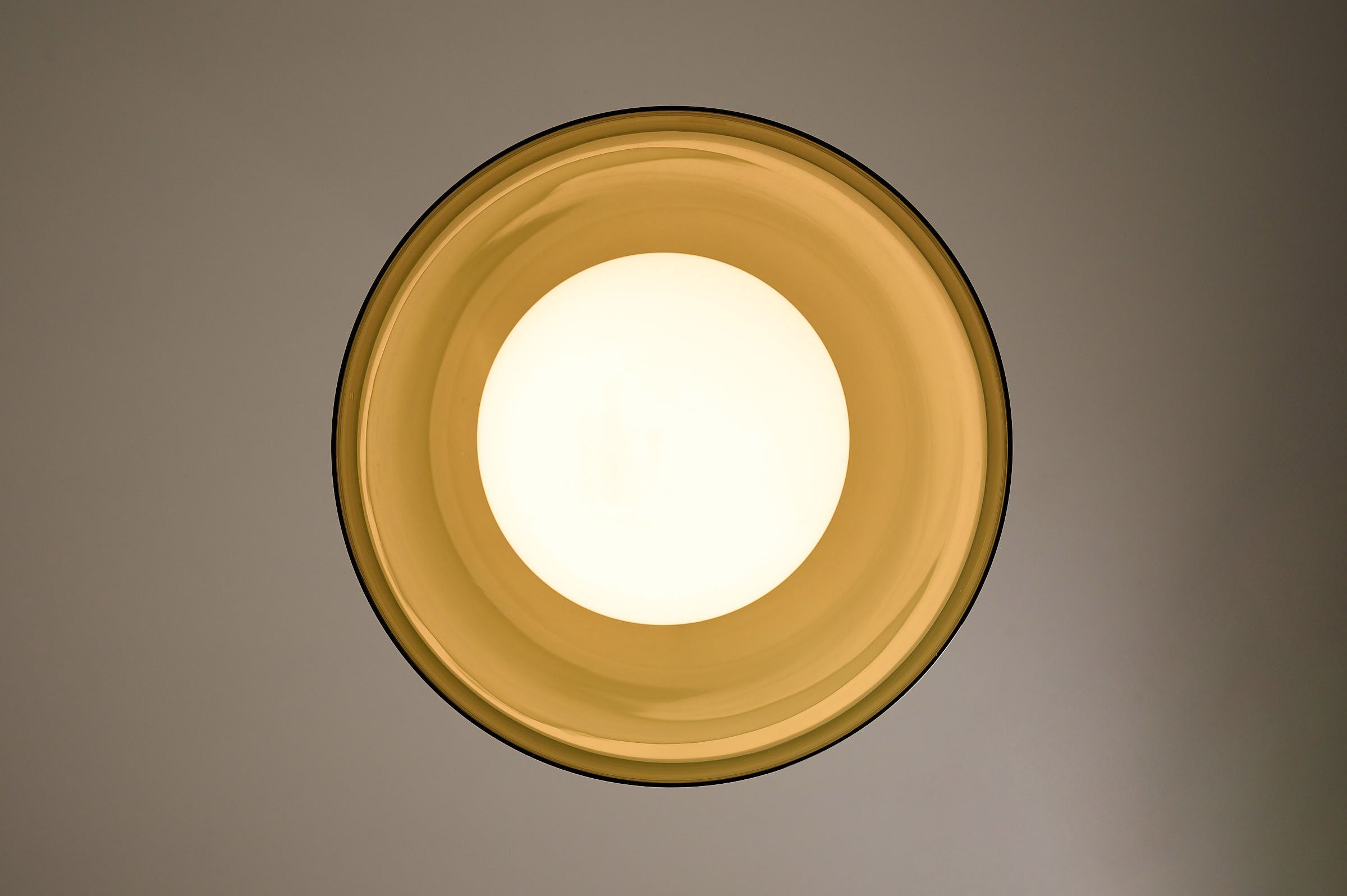 Space Age Blown Glass Pendant Lamp by Vistosi, Italy, 1970s, featuring translucent olive green glass and white opaline core.