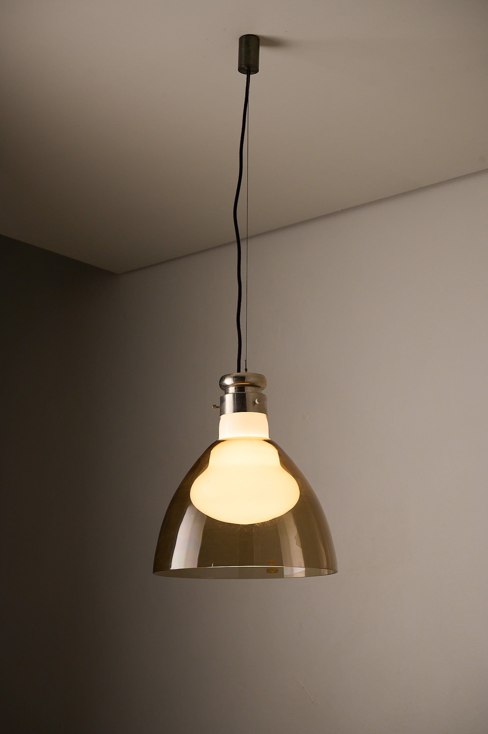 Space Age Blown Glass Pendant Lamp by Vistosi, Italy, 1970s hanging from the ceiling with smoked glass shade.