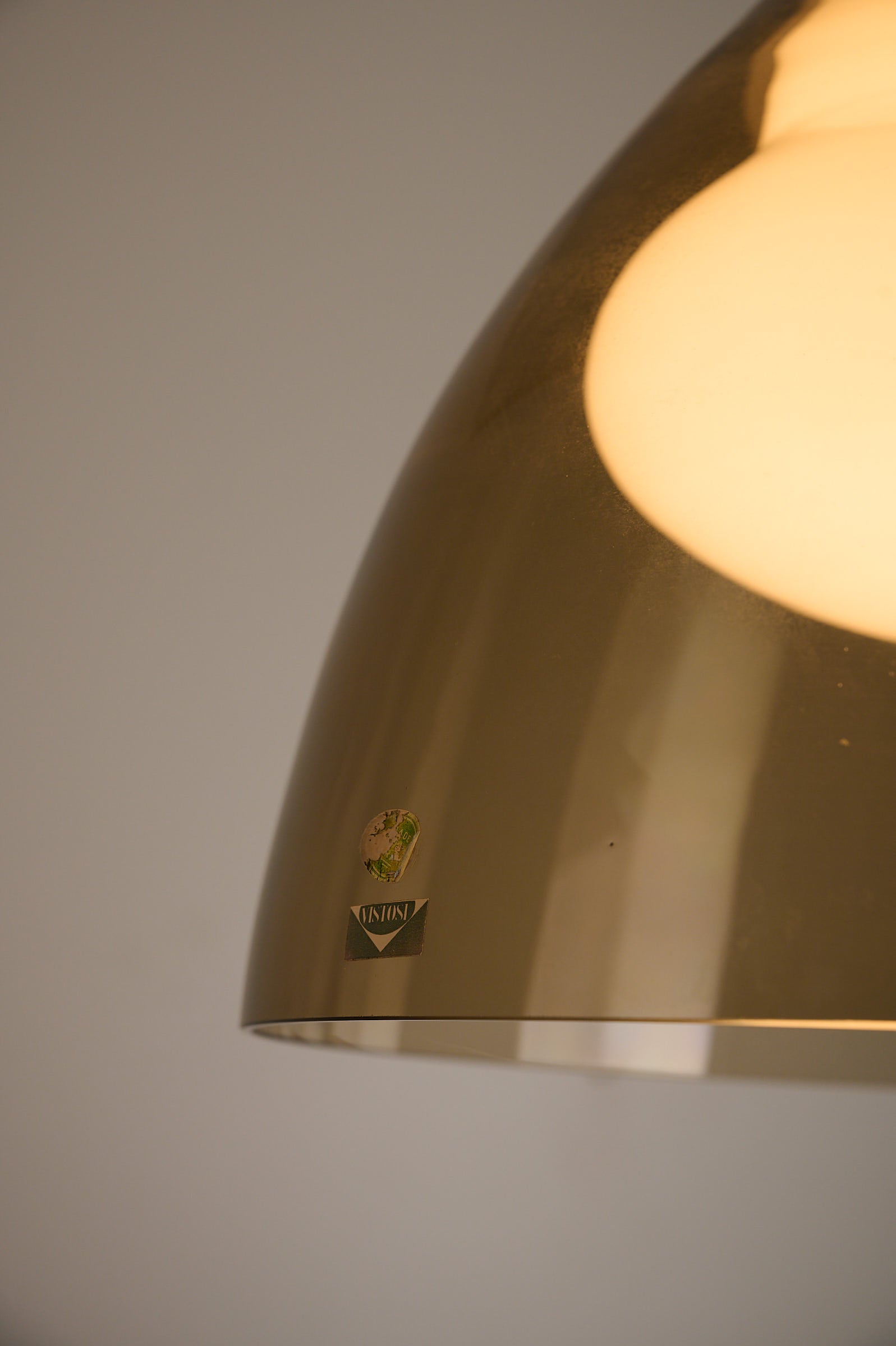 Close-up of the Space Age Blown Glass Pendant Lamp by Vistosi, Italy, 1970s showing its beautiful design and logo.