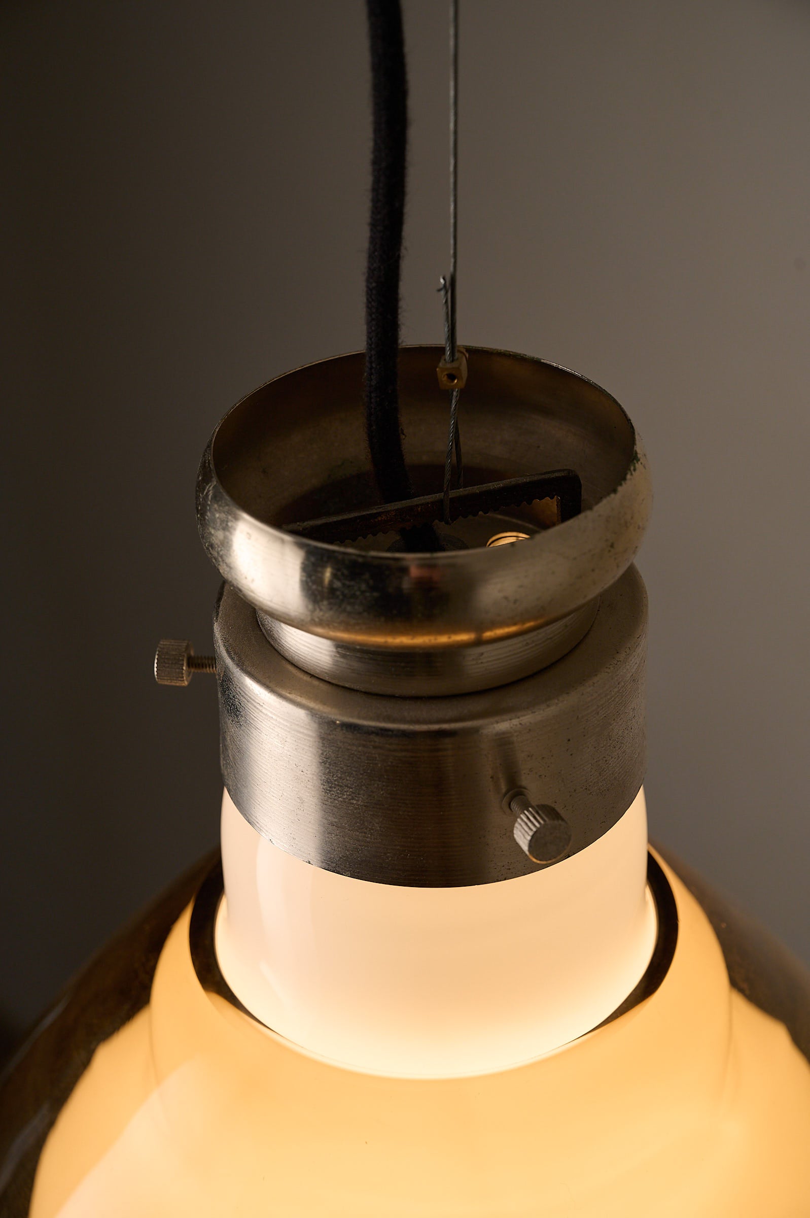 Space Age Blown Glass Pendant Lamp by Vistosi, Italy, 1970s close-up of brushed aluminum collar and opaline glass core.