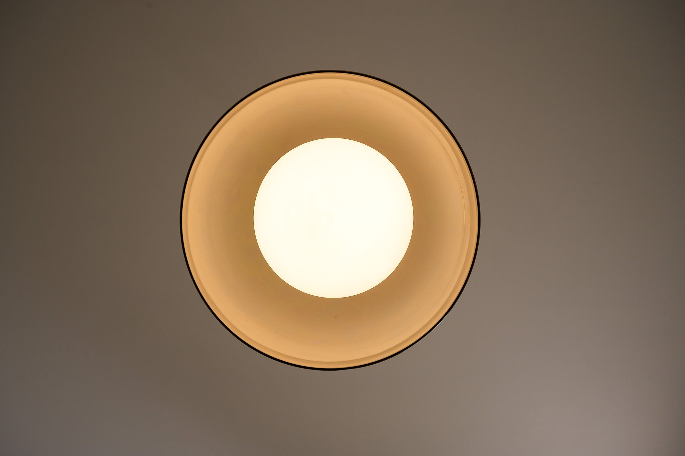Space Age Blown Glass Pendant Lamp by Vistosi, Italy, 1970s featuring dome-shaped smoky brown glass.