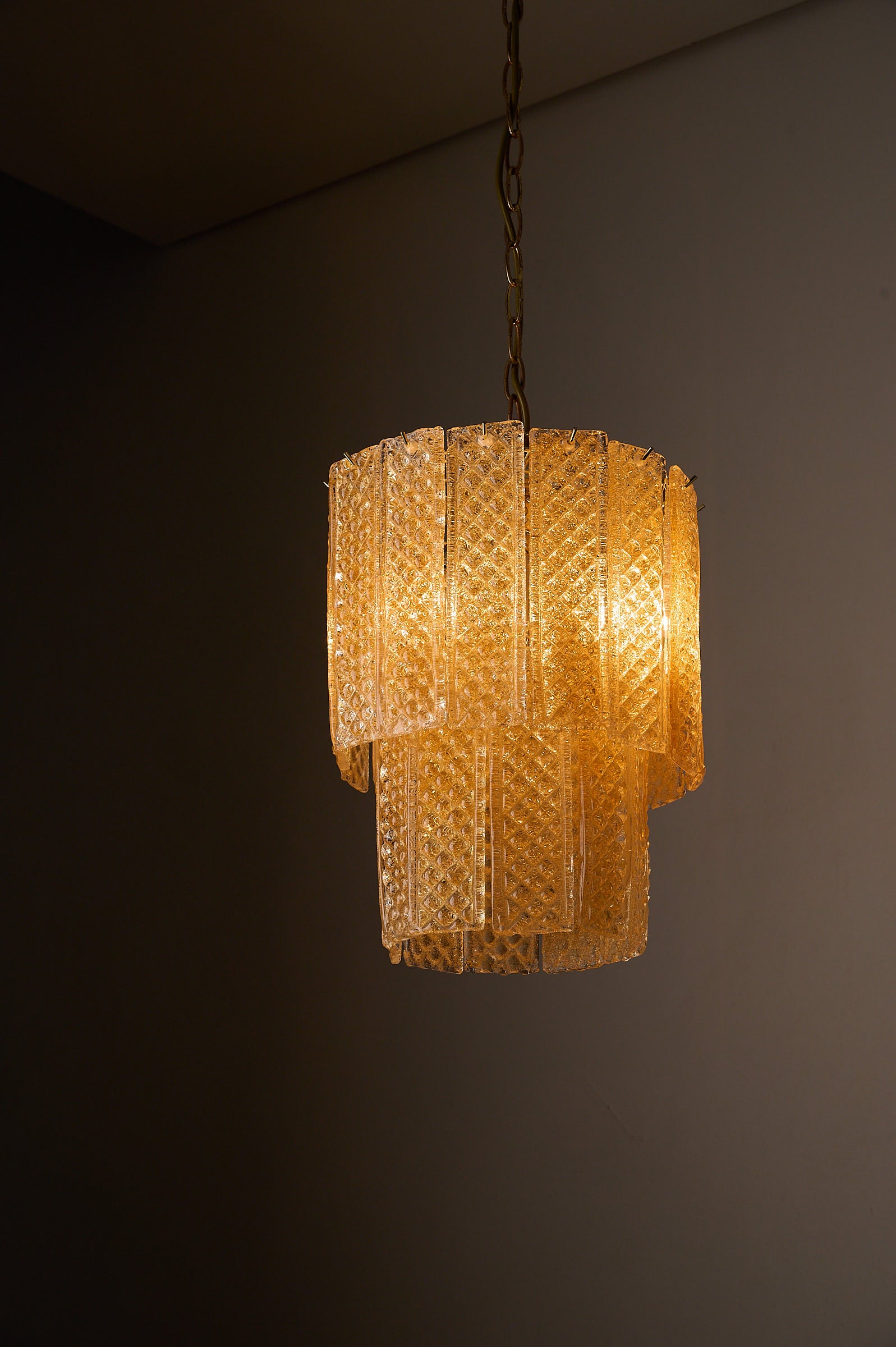 Textured Yellow Glass Panel Chandelier, Europe, 1970s with geometric glass panels and soft yellow hue.