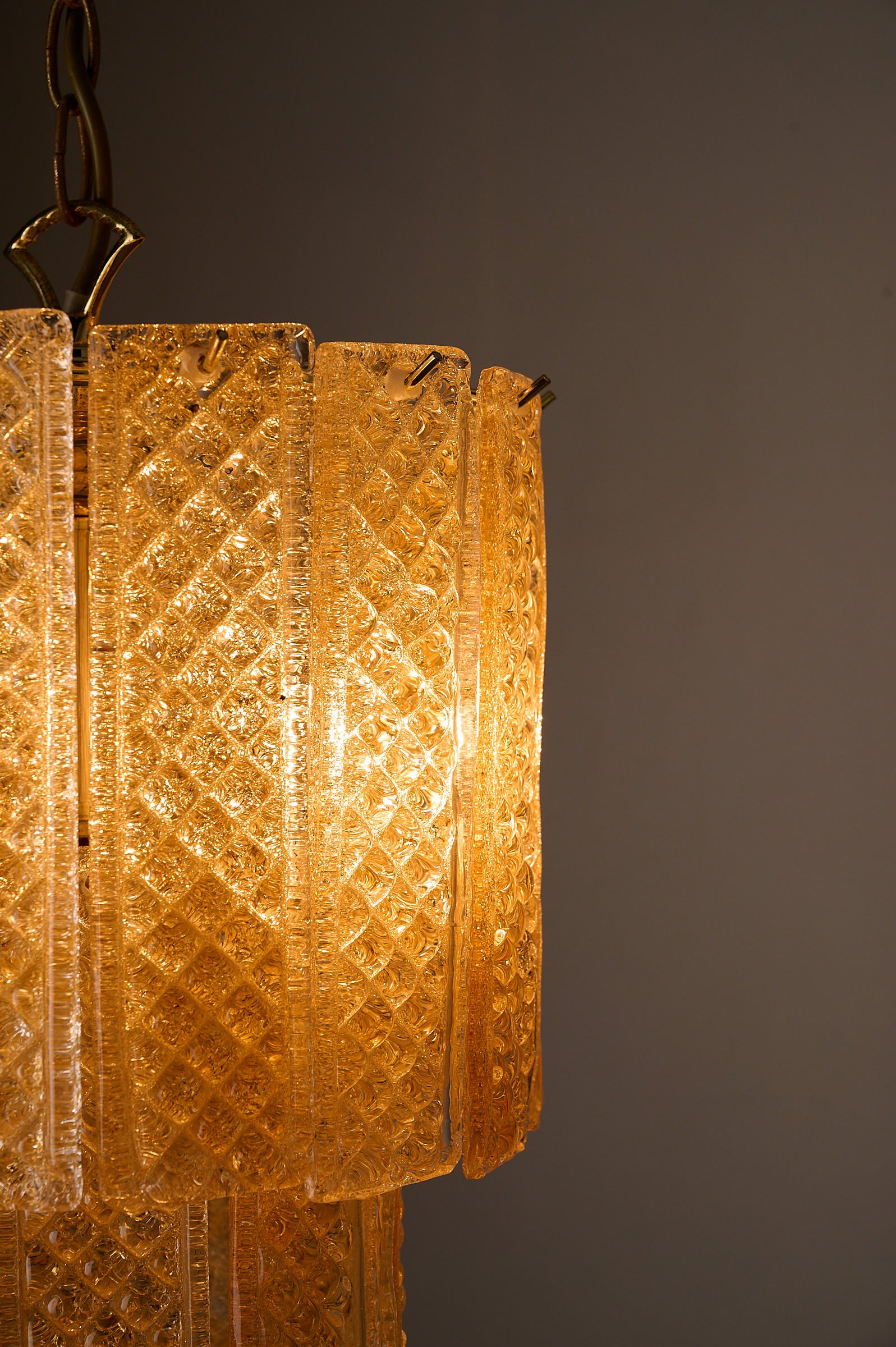 Textured Yellow Glass Panel Chandelier, Europe, 1970s showcasing geometric glass panels with a warm glow.
