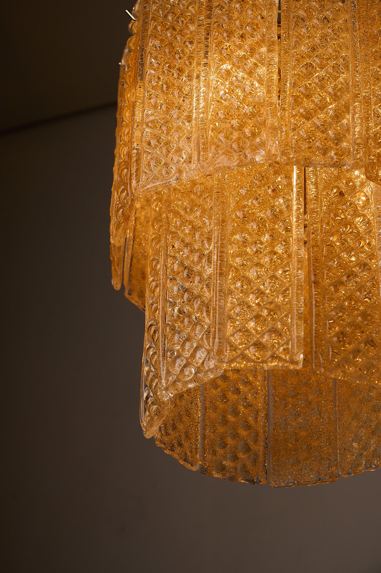 Textured Yellow Glass Panel Chandelier, Europe, 1970s showcasing geometric glass panels in a warm, straw-yellow hue.