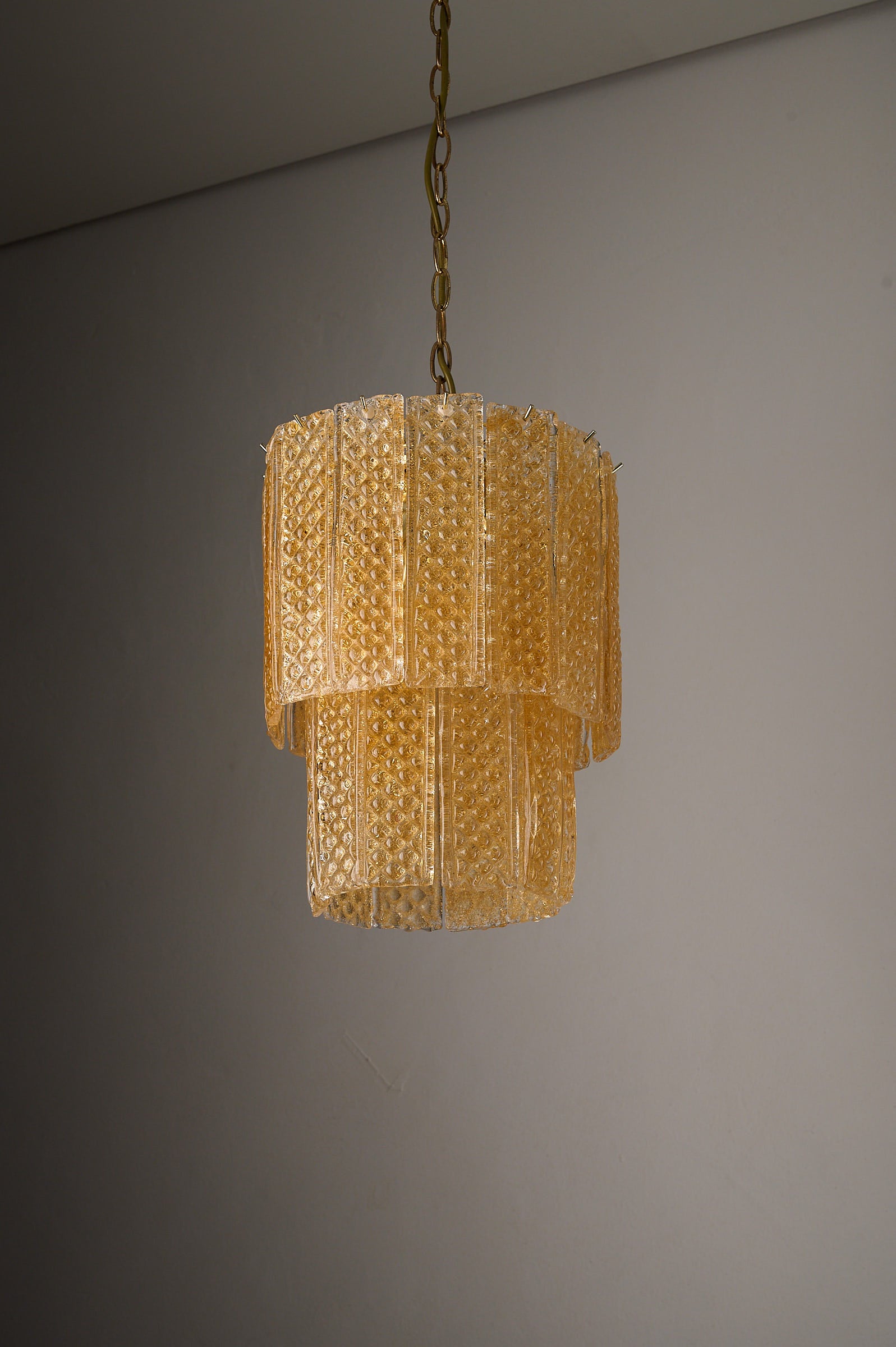 Textured Yellow Glass Panel Chandelier, Europe, 1970s with geometric glass panels in soft yellow hue.