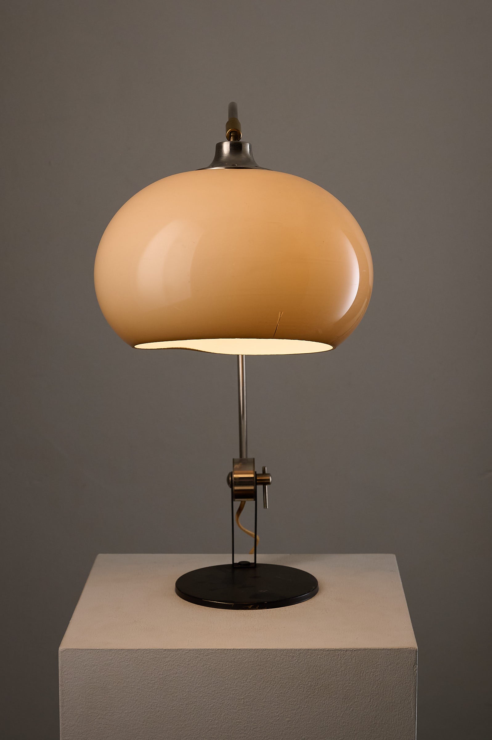 Chrome Arc Desk Lamp by Cosack Leuchten, Germany, 1970s on display with amber acrylic shade.