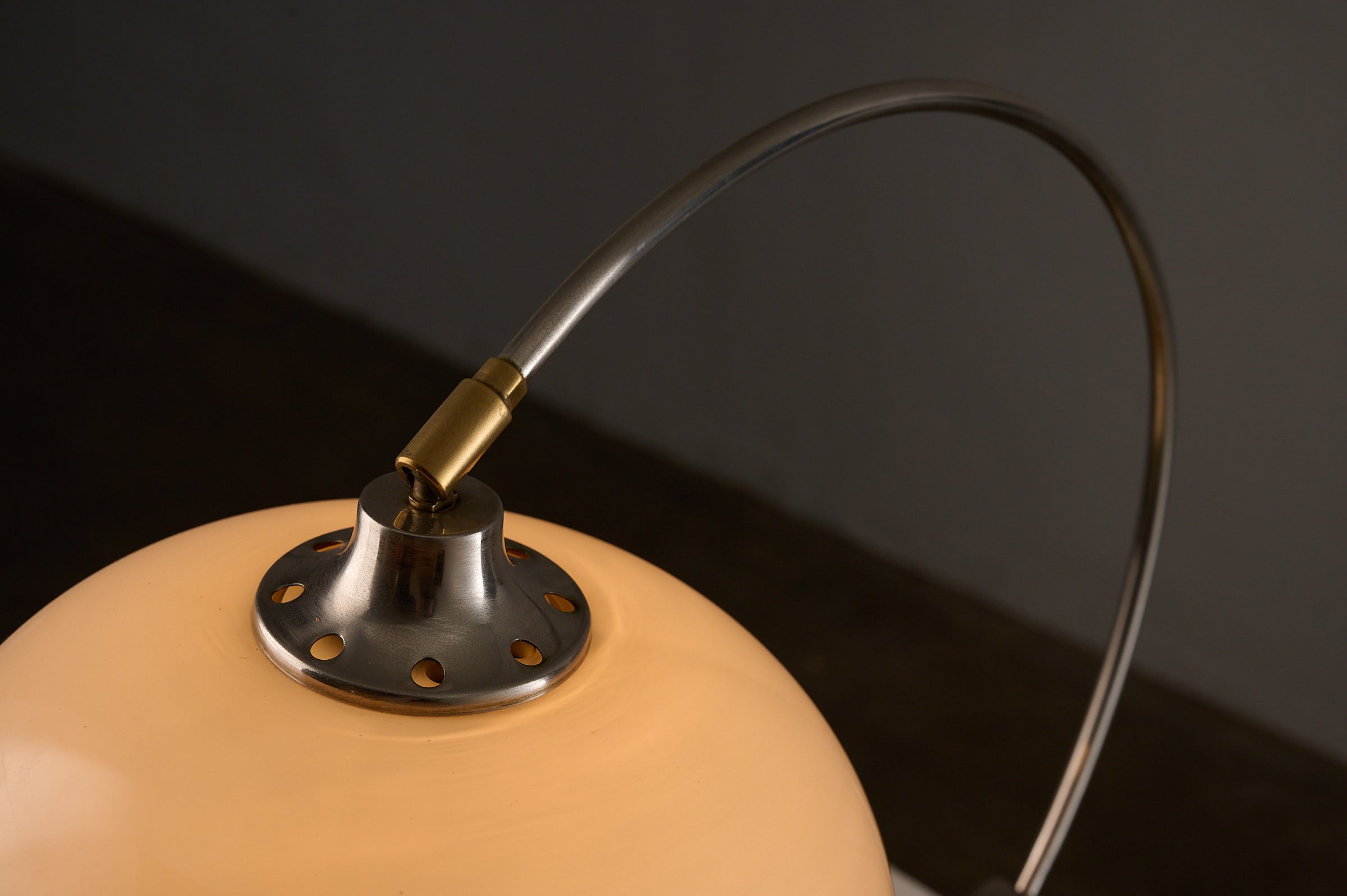 Close-up of the Chrome Arc Desk Lamp by Cosack Leuchten, Germany, 1970s showcasing its sleek design and lamp shade.