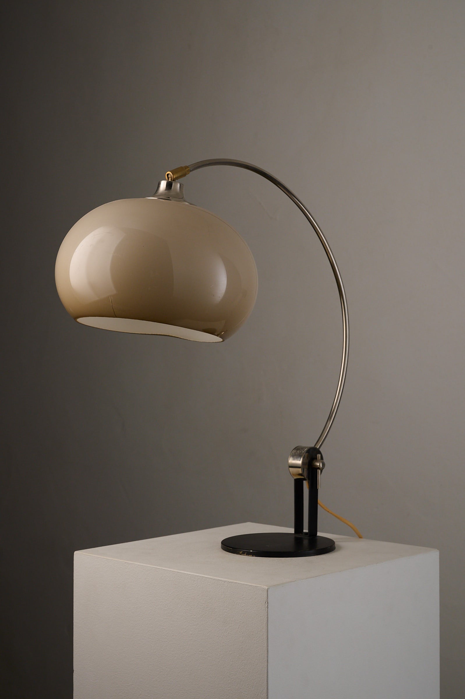 Chrome Arc Desk Lamp by Cosack Leuchten, Germany, 1970s on a pedestal in soft lighting