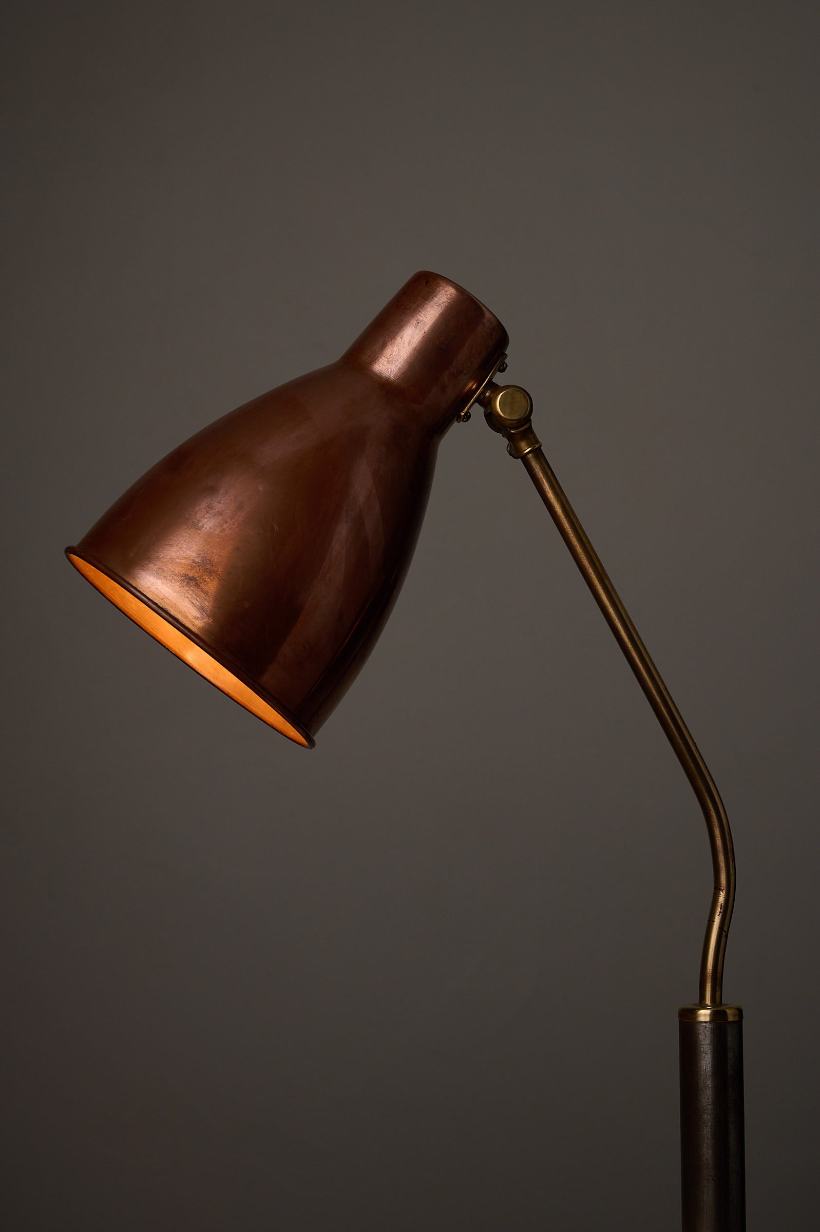 Mid-Century Modern Copper & Brass Desk Lamp, Europe, 1950s with adjustable cone shade and brass arm.