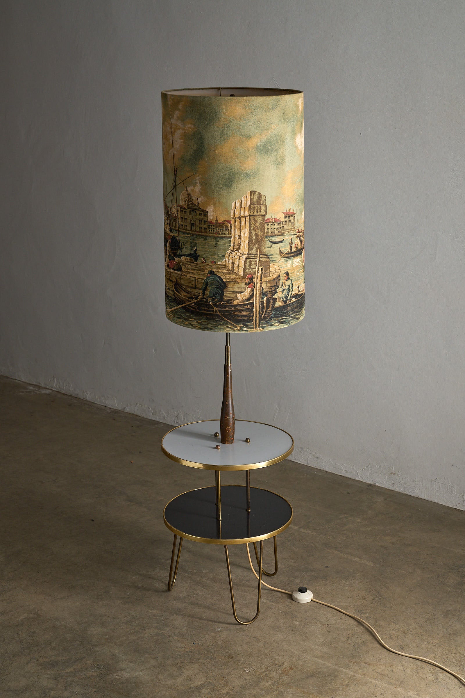 Brass Hairpin Table Floor Lamp with Venetian Shade featuring a two-tiered table and hand-painted engravings.