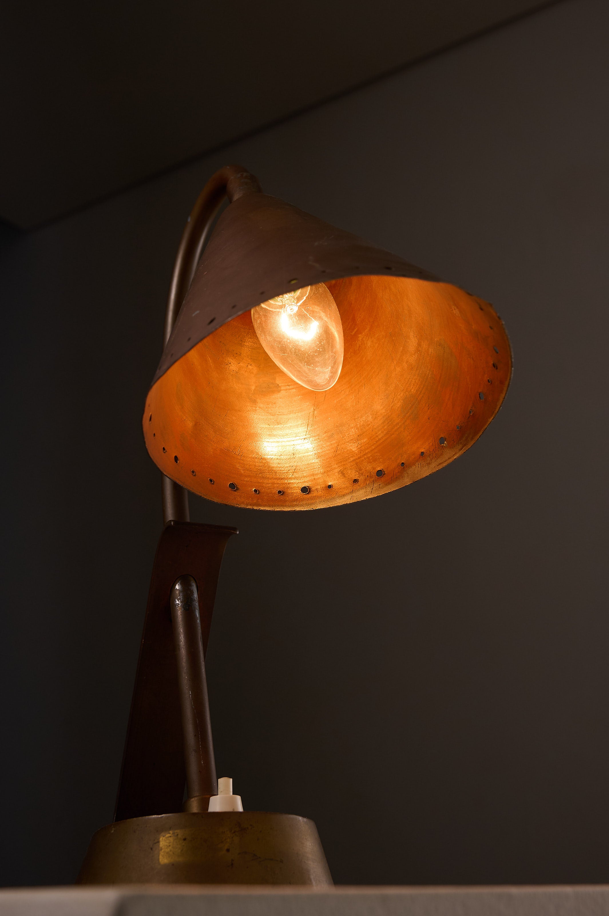 Copper & Brass Table Lamp, France featuring a perforated copper shade and brass stem, ideal for accenting mid-century decor.