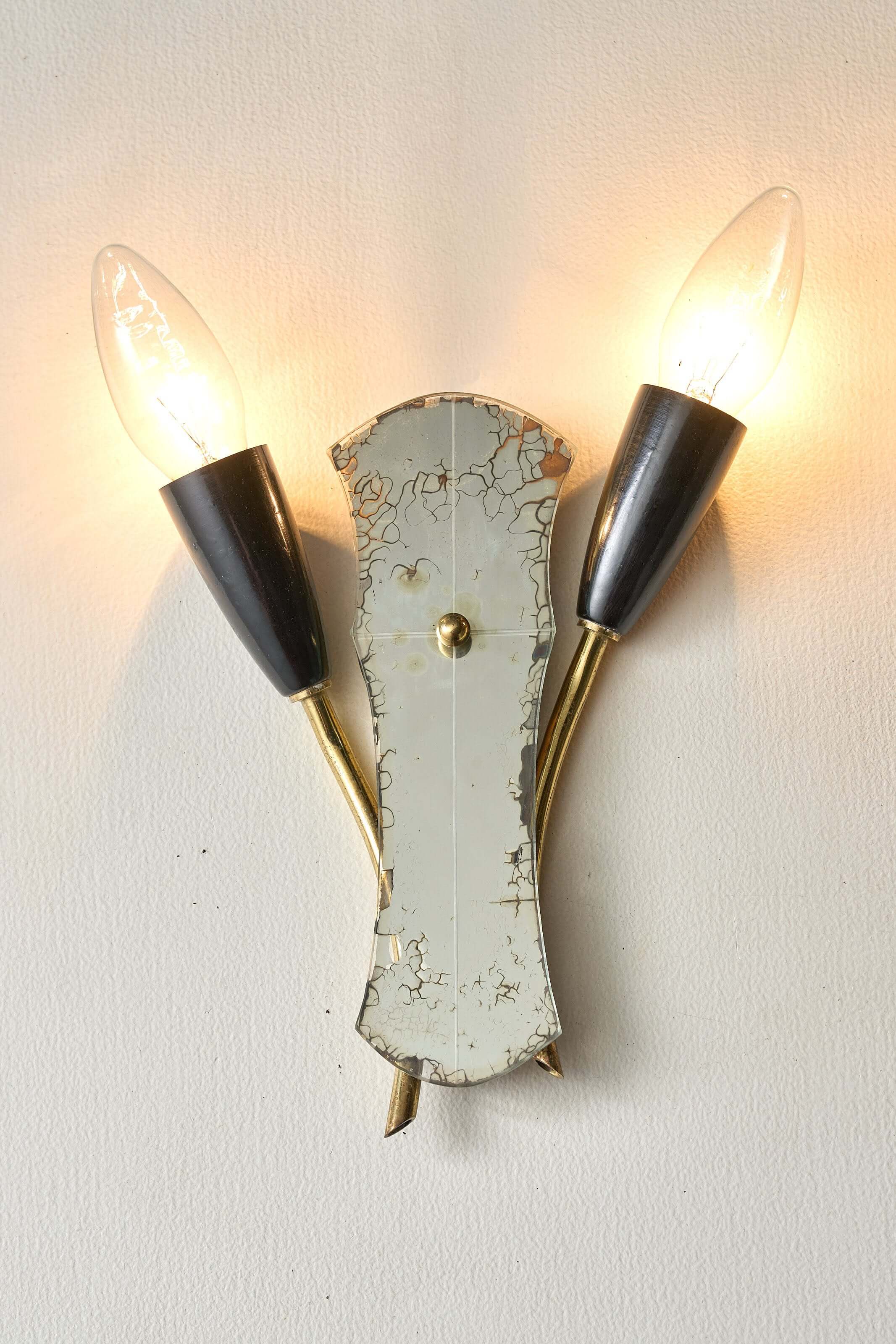 Brass and Mirrored Glass Wall Lamp, 1950s featuring curved tubes and mirrored surface, perfect for vintage decor.
