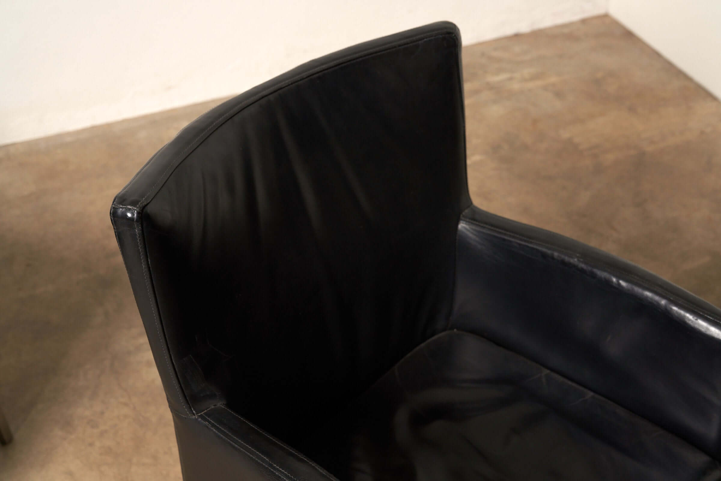 Black Leather Armchair featuring smooth leather and modern design, part of the Red or Black Leather Armchairs collection.