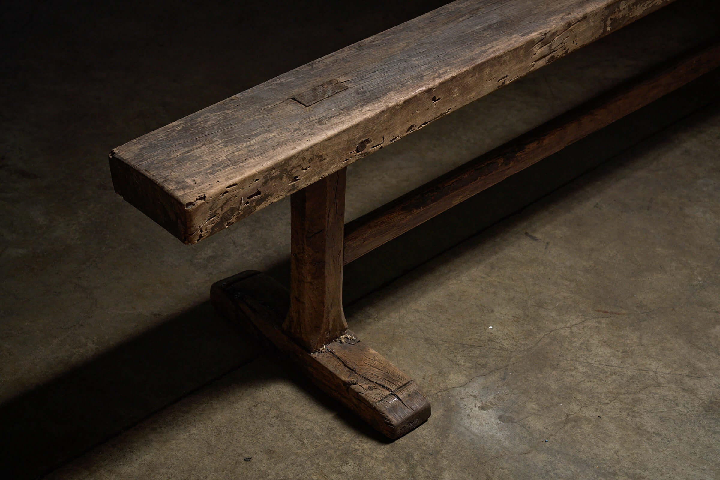 Spanish Trestle Bench in Solid Wood showcasing primitive construction and weathered patina.
