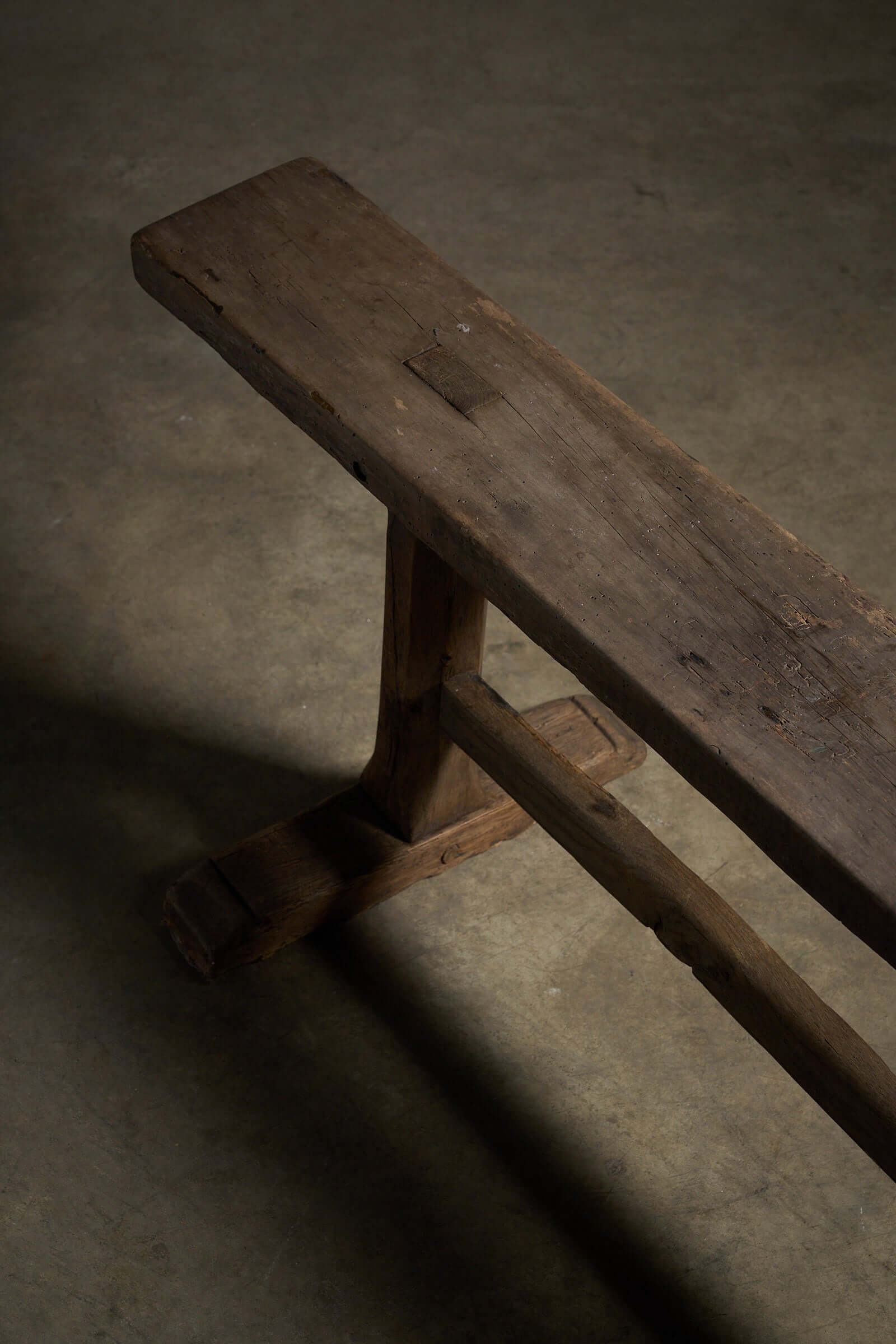 Spanish Trestle Bench in Solid Wood with rustic design and sturdy T-shaped trestle legs.