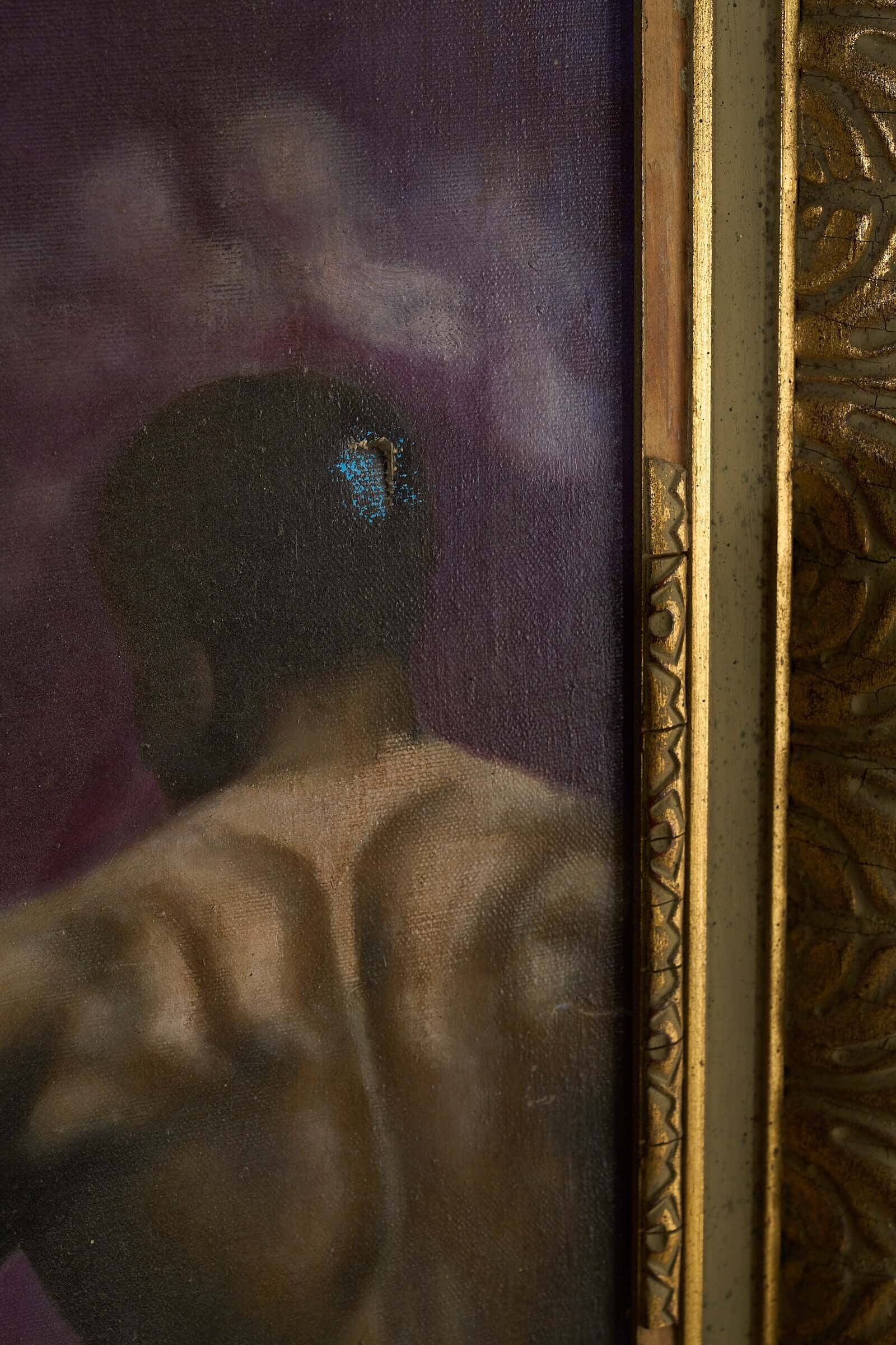 Detail of the painting "Changing Winds," signed by the artist G. Nathan, featuring a figure's back against a purple backdrop.