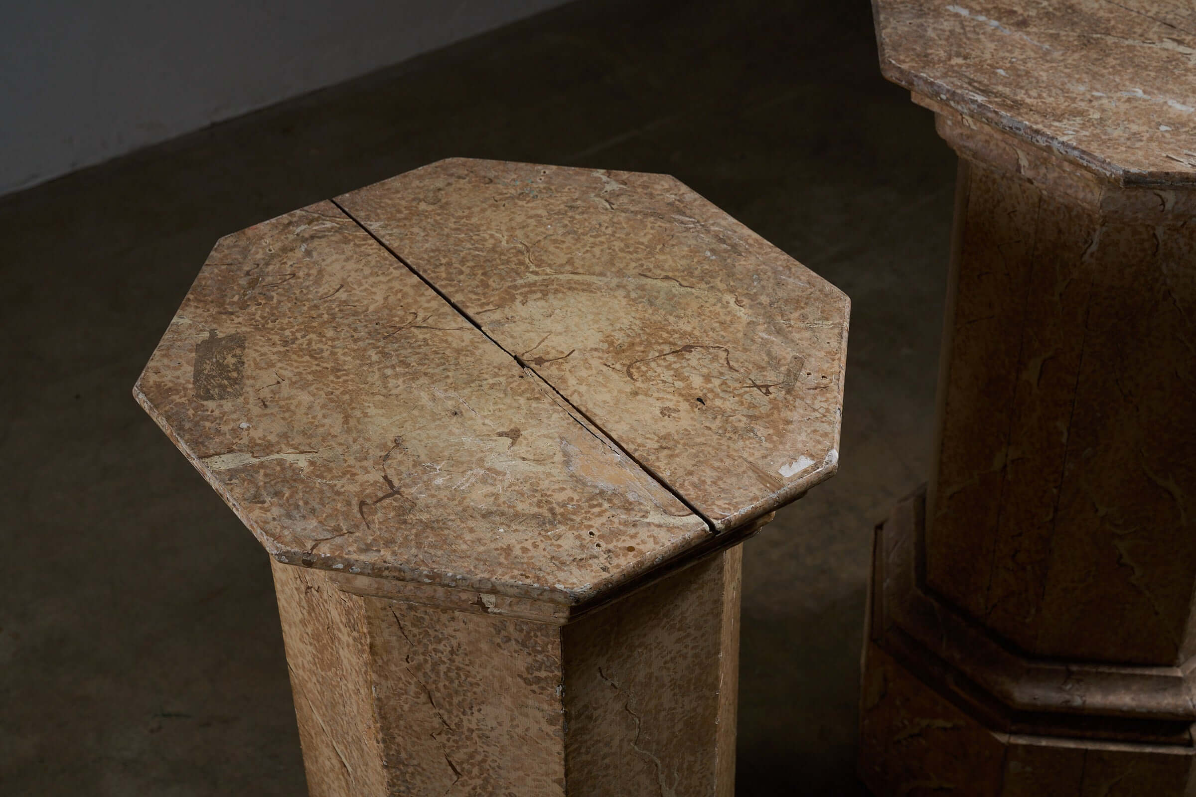 Pair of Antique Faux Marble Octagonal Pedestals showcasing hand-painted faux marbre finish and unique octagonal design.