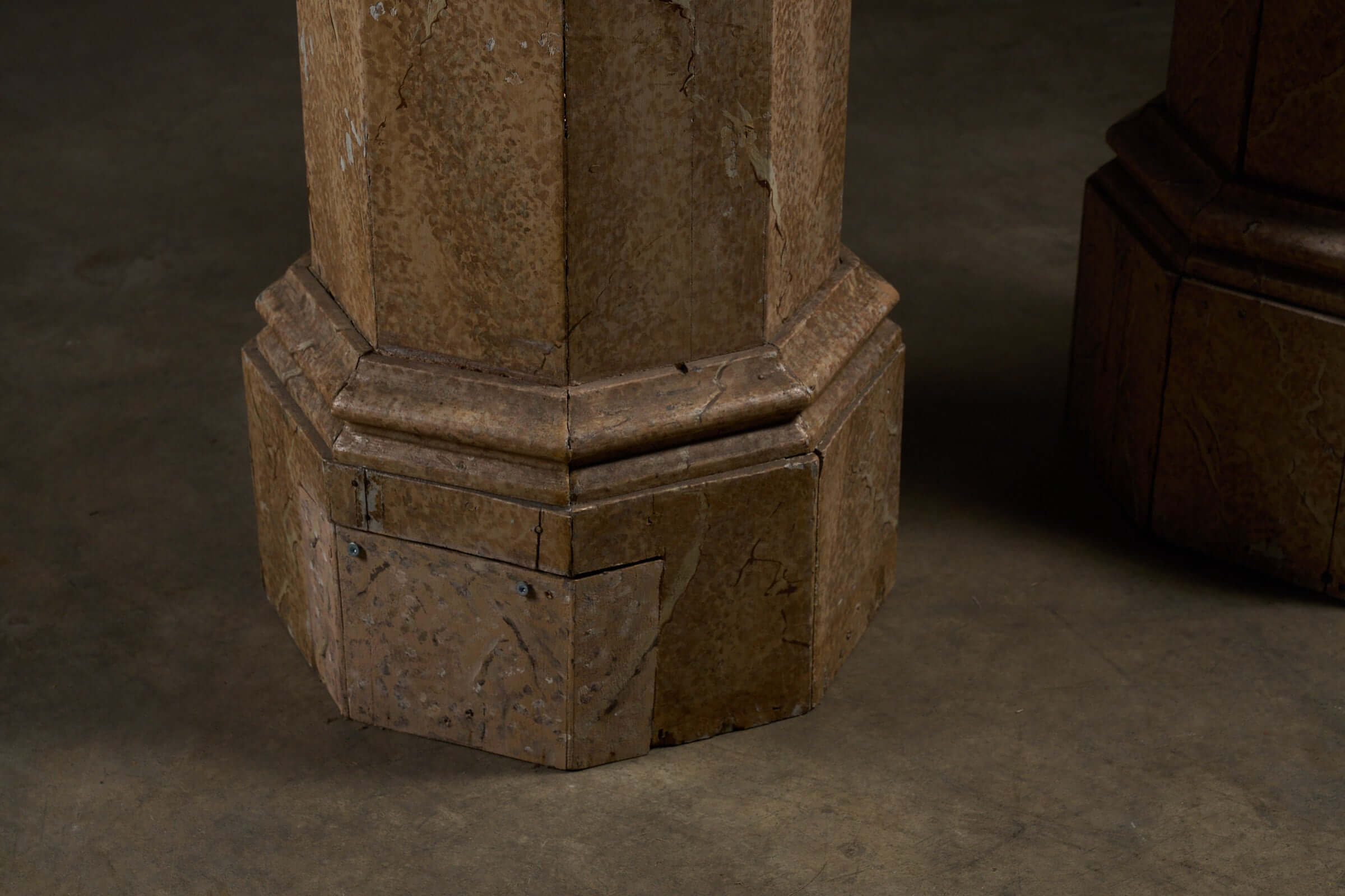 Pair of Antique Faux Marble Octagonal Pedestals base detail showcasing trompe-l'œil finish and unique height variation.