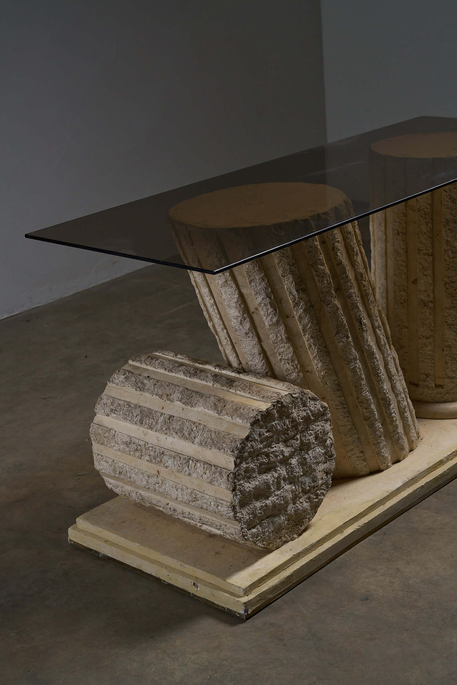 Postmodern 'Greek Ruins' Console Table in Mactan Stone 1980s featuring sculptural column base.