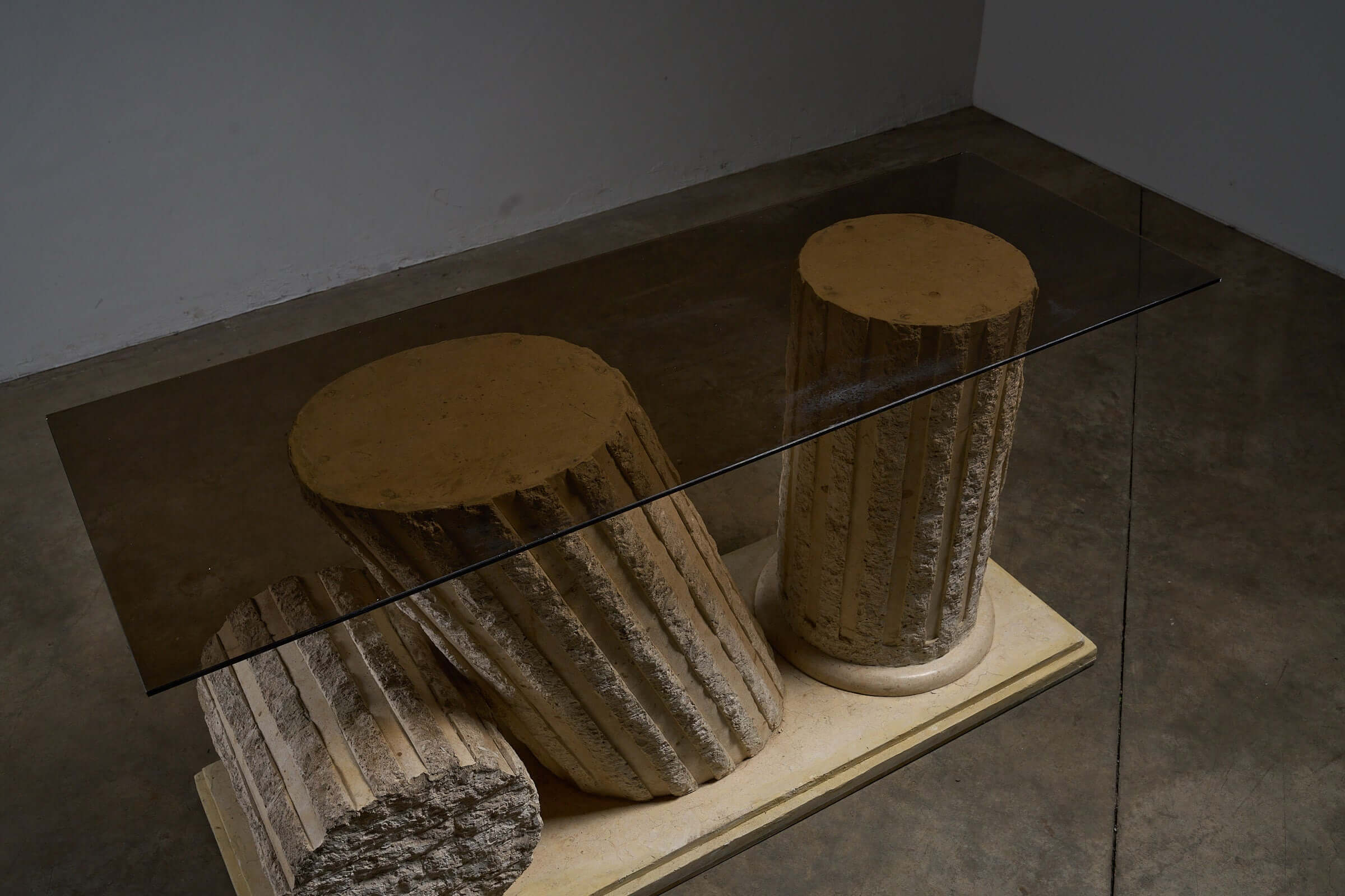 Postmodern 'Greek Ruins' Console Table in Mactan Stone 1980s featuring sculptural fluted columns.