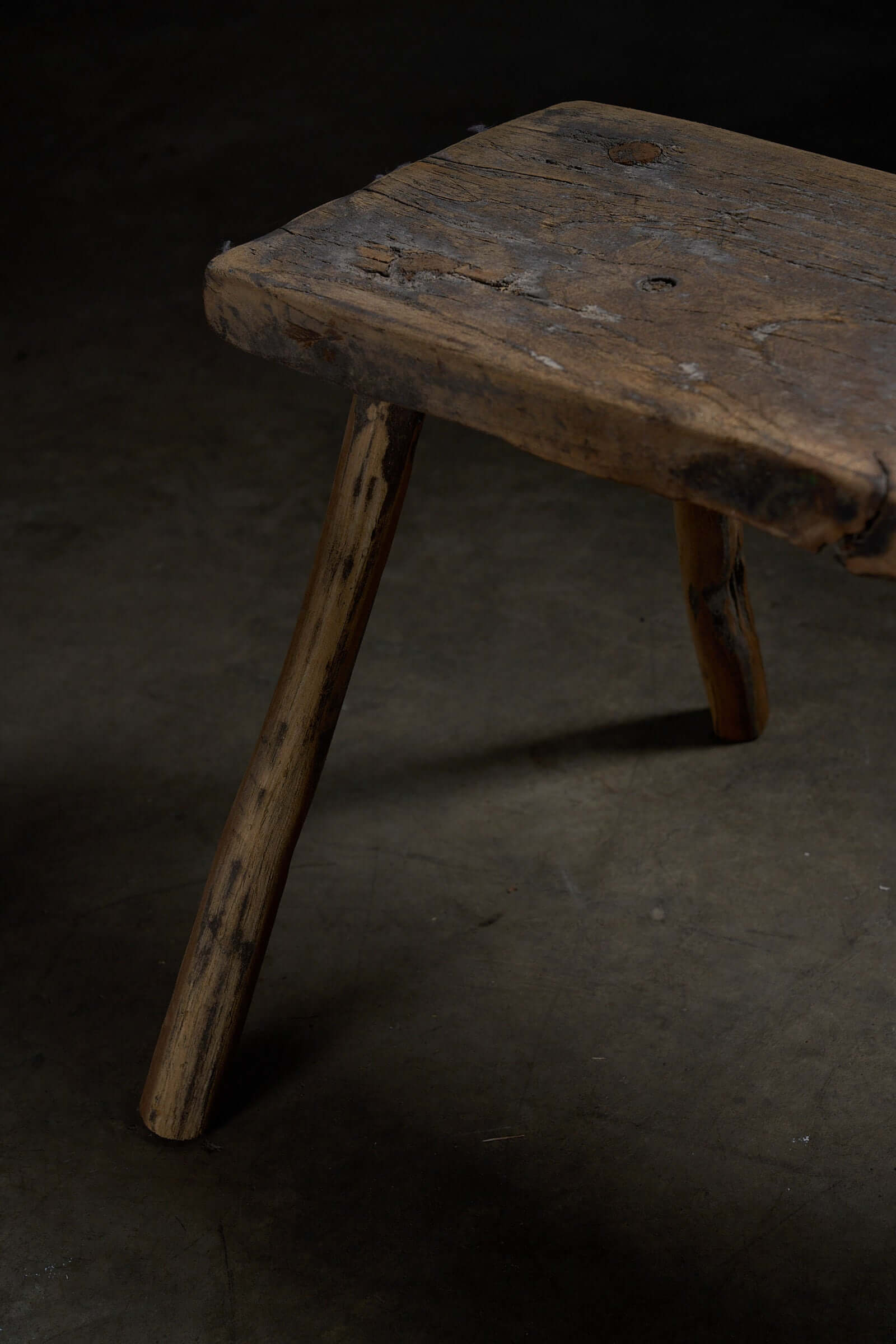 Antique Wooden Stools with textured wood surface and rustic design, perfect as side tables.