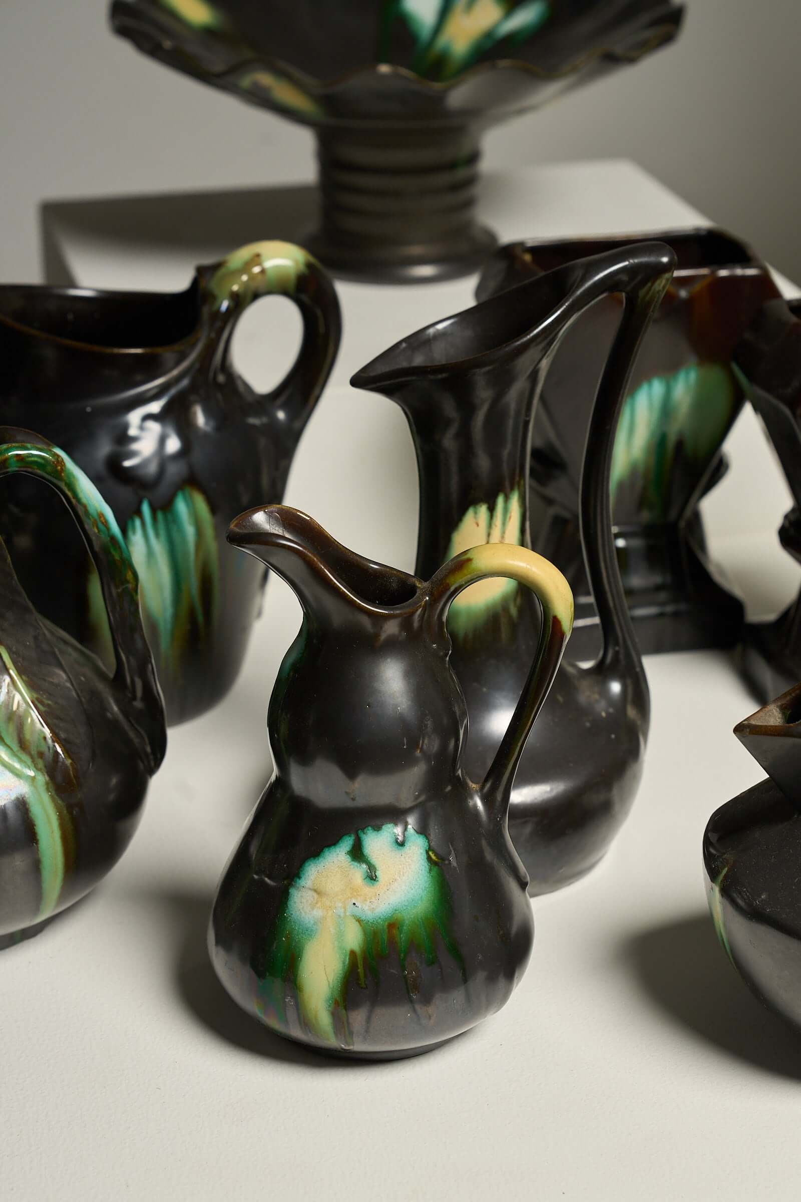 Large Collection of Belgian Art Deco Drip Glaze Ceramics 1920s featuring drip glaze pitchers and vases.