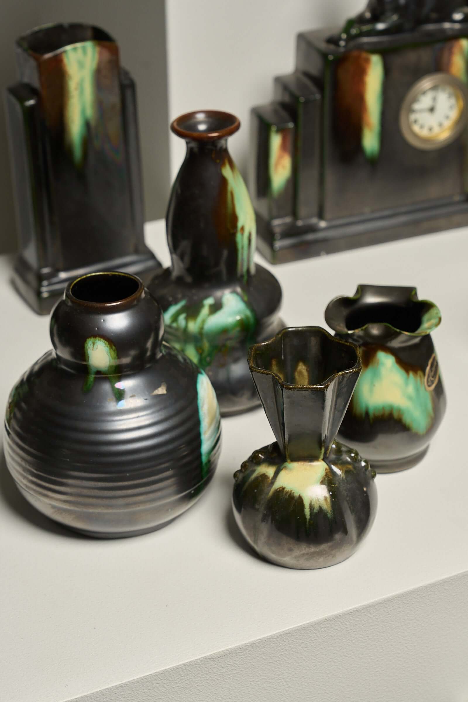 Large Collection of Belgian Art Deco Drip Glaze Ceramics 1920s featuring vases with flammé glaze technique.