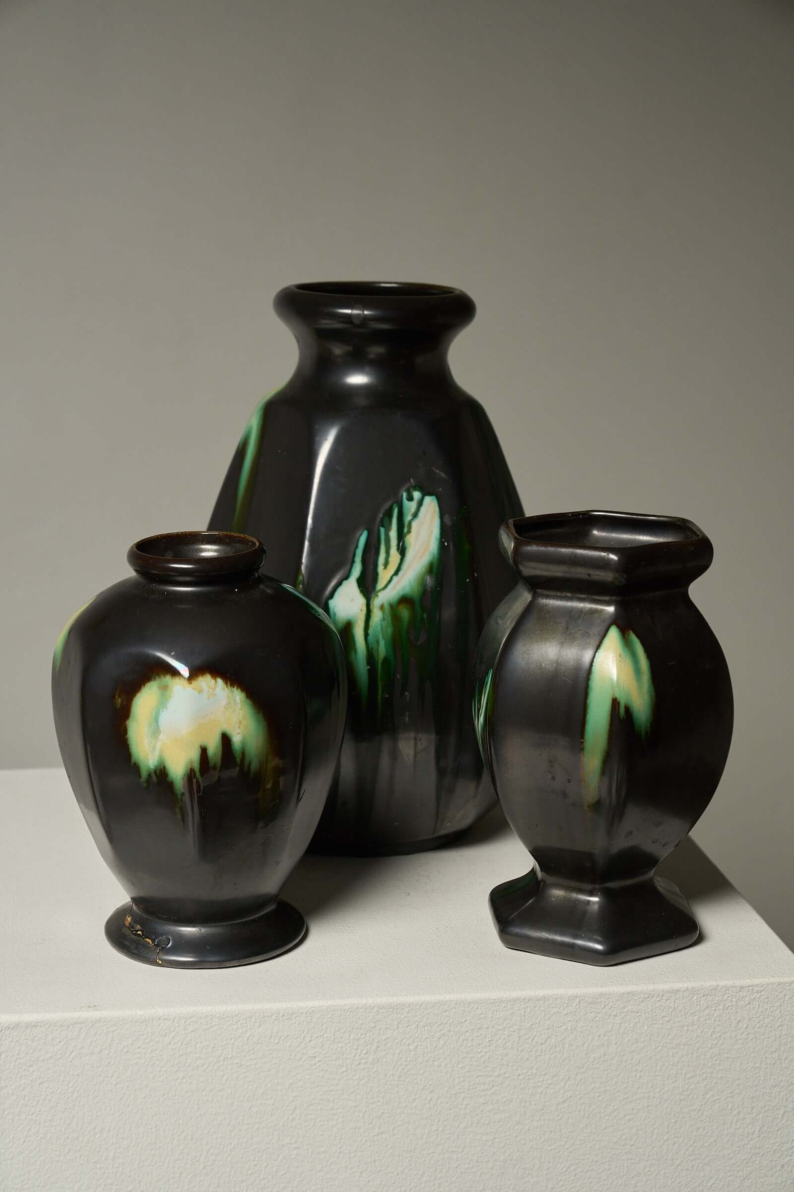 Large Collection of Belgian Art Deco Drip Glaze Ceramics 1920s featuring three elegant ceramic vases with flammé glazes.
