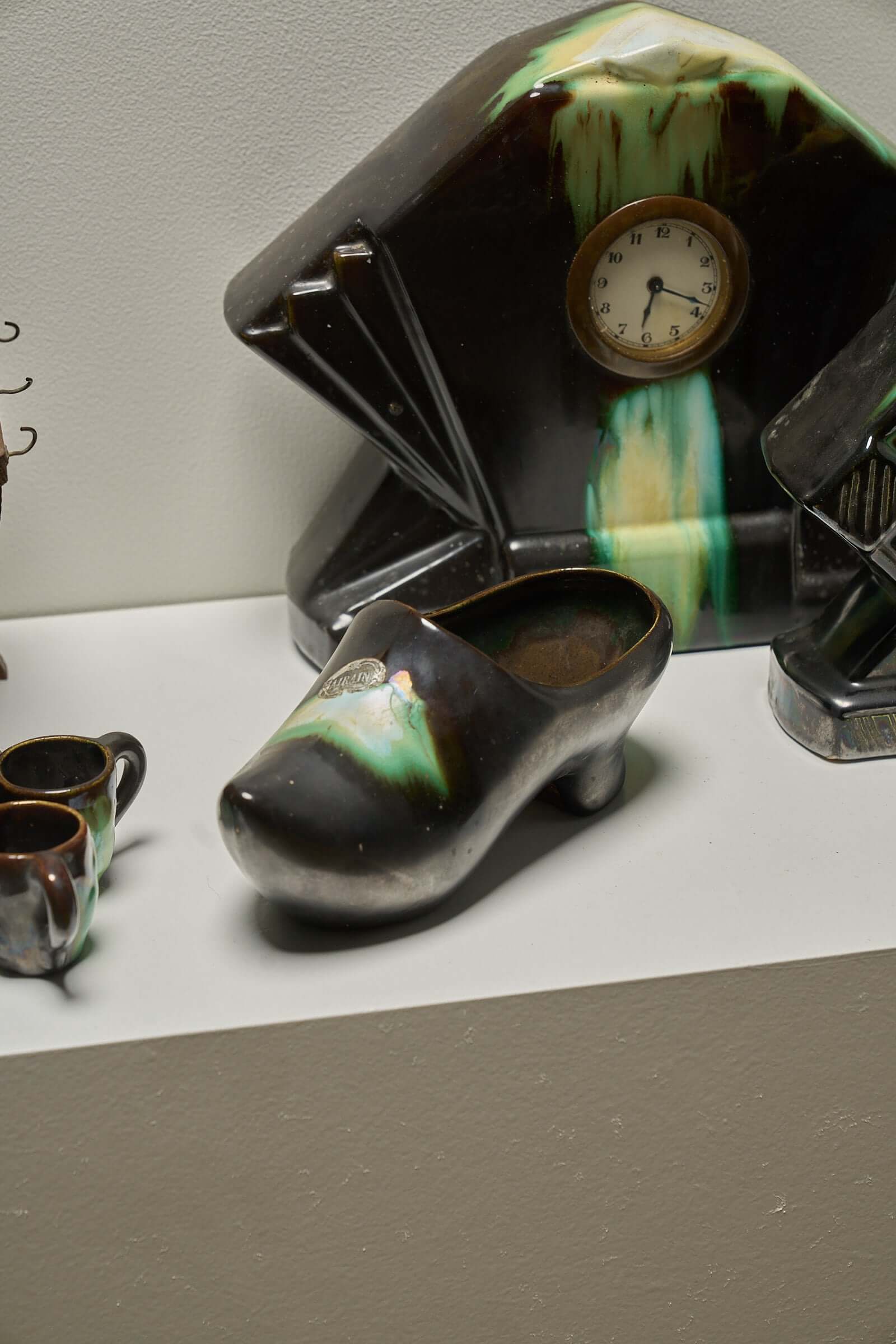 Large Collection of Belgian Art Deco Drip Glaze Ceramics 1920s featuring a unique shoe and mantel clock.