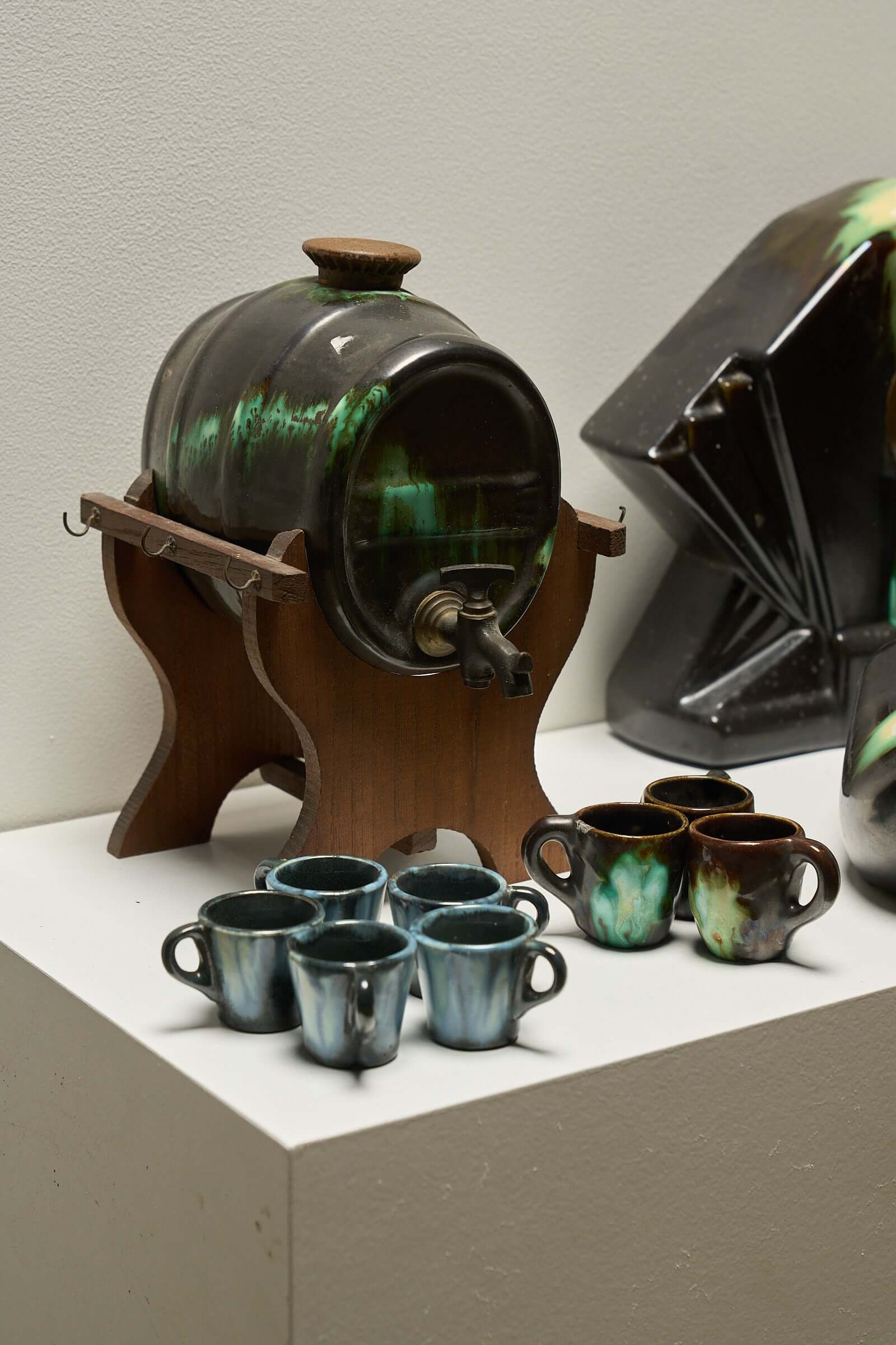 Large Collection of Belgian Art Deco Drip Glaze Ceramics 1920s including a glazed barrel and small cups.