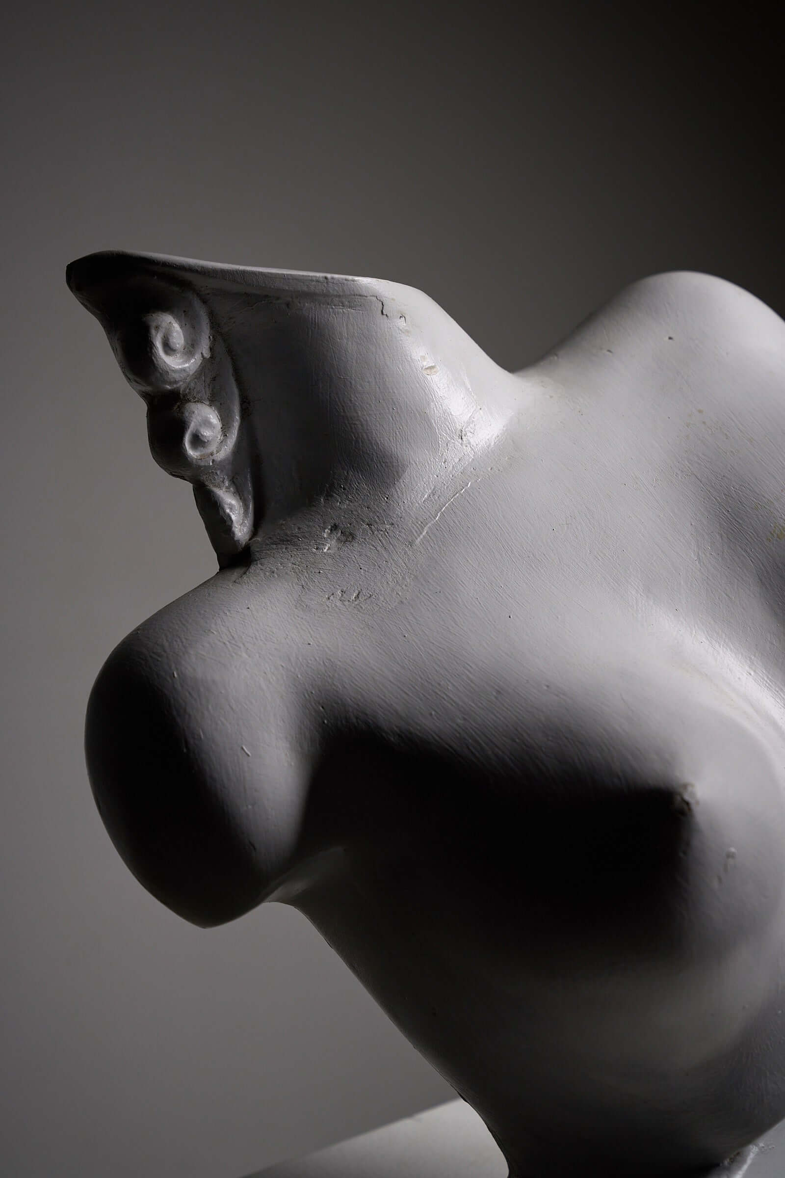 Mid-Century Plaster Display Busts by Hirondelle showcasing stylized female form in soft gray tones.