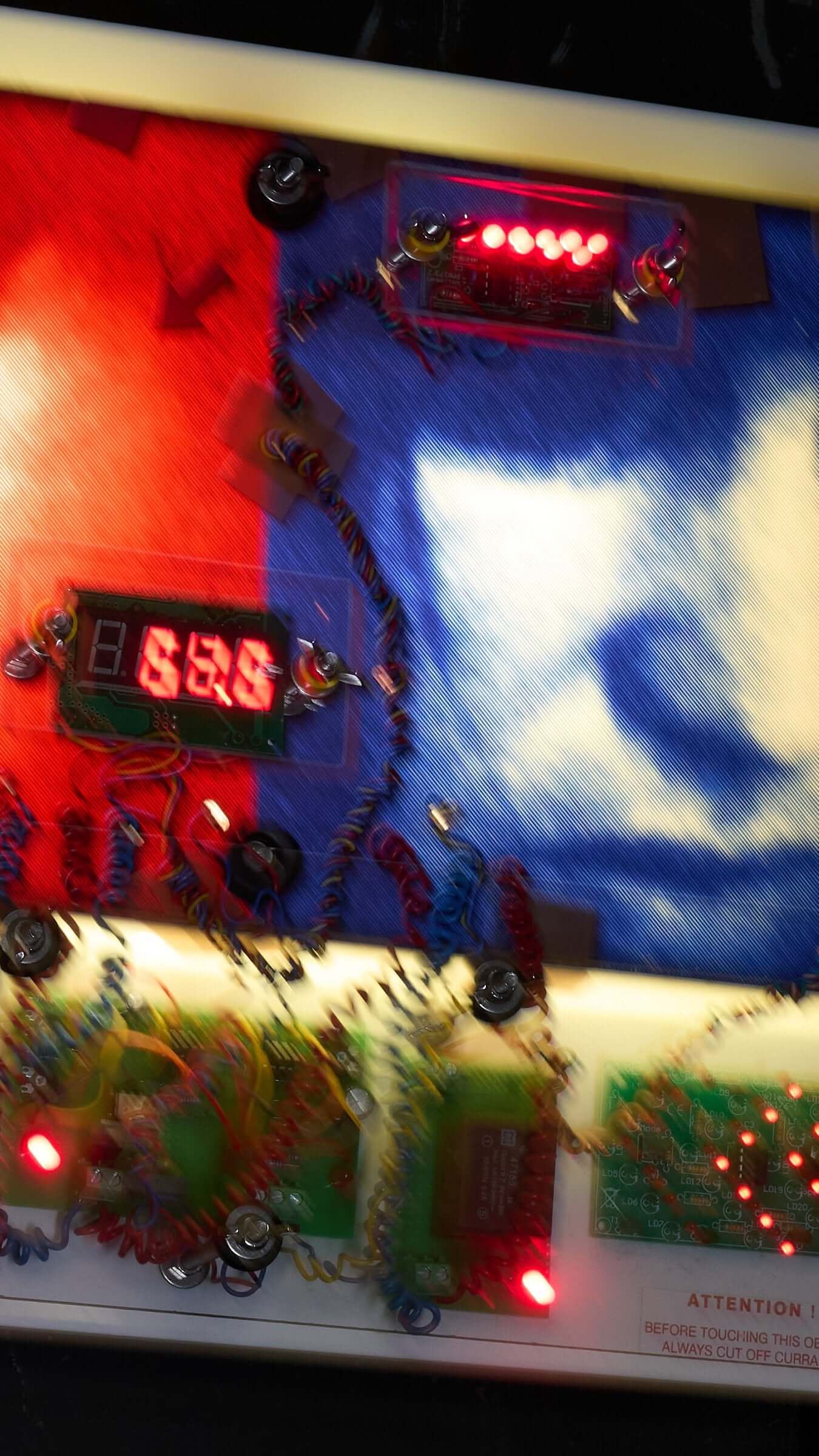 The Ulrike Meinhof Shopping Bag Installation by Eduard Van Giel (2017) with mixed media elements and digital displays.