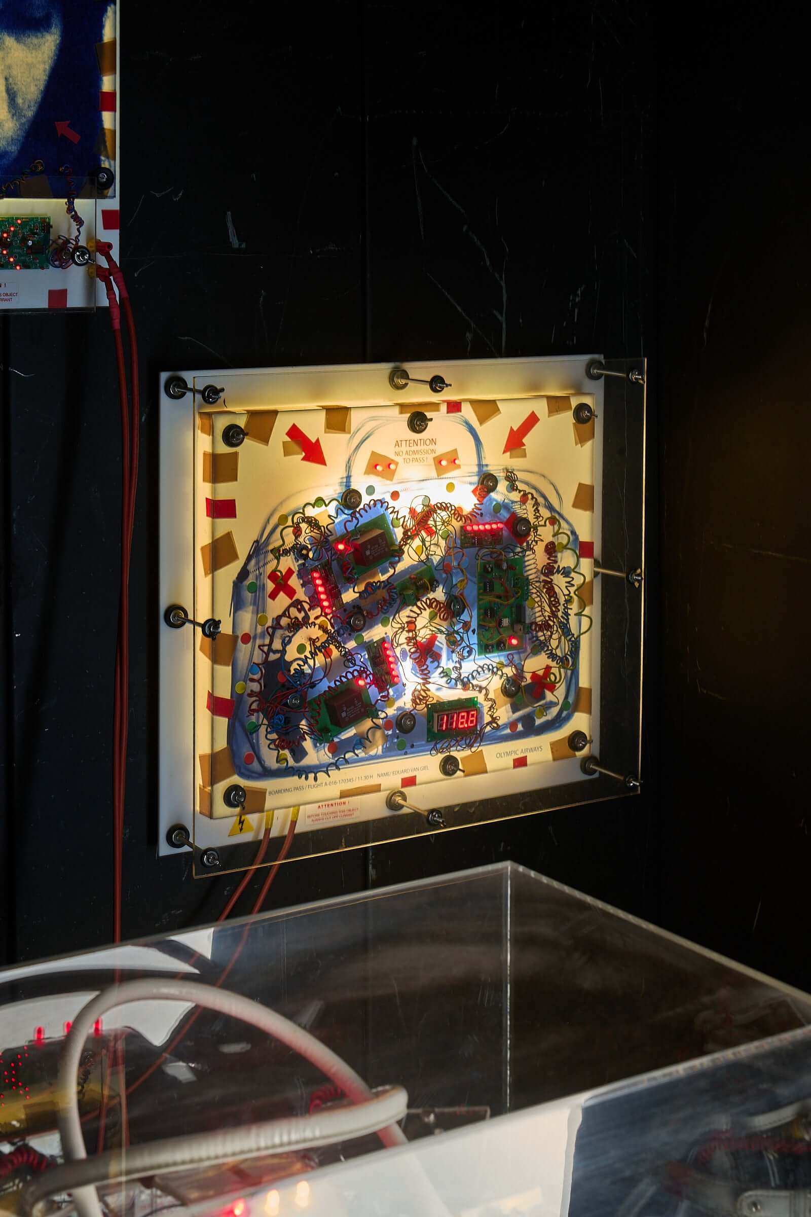 The Ulrike Meinhof Shopping Bag Installation by Eduard Van Giel (2017) showcasing mixed-media elements.