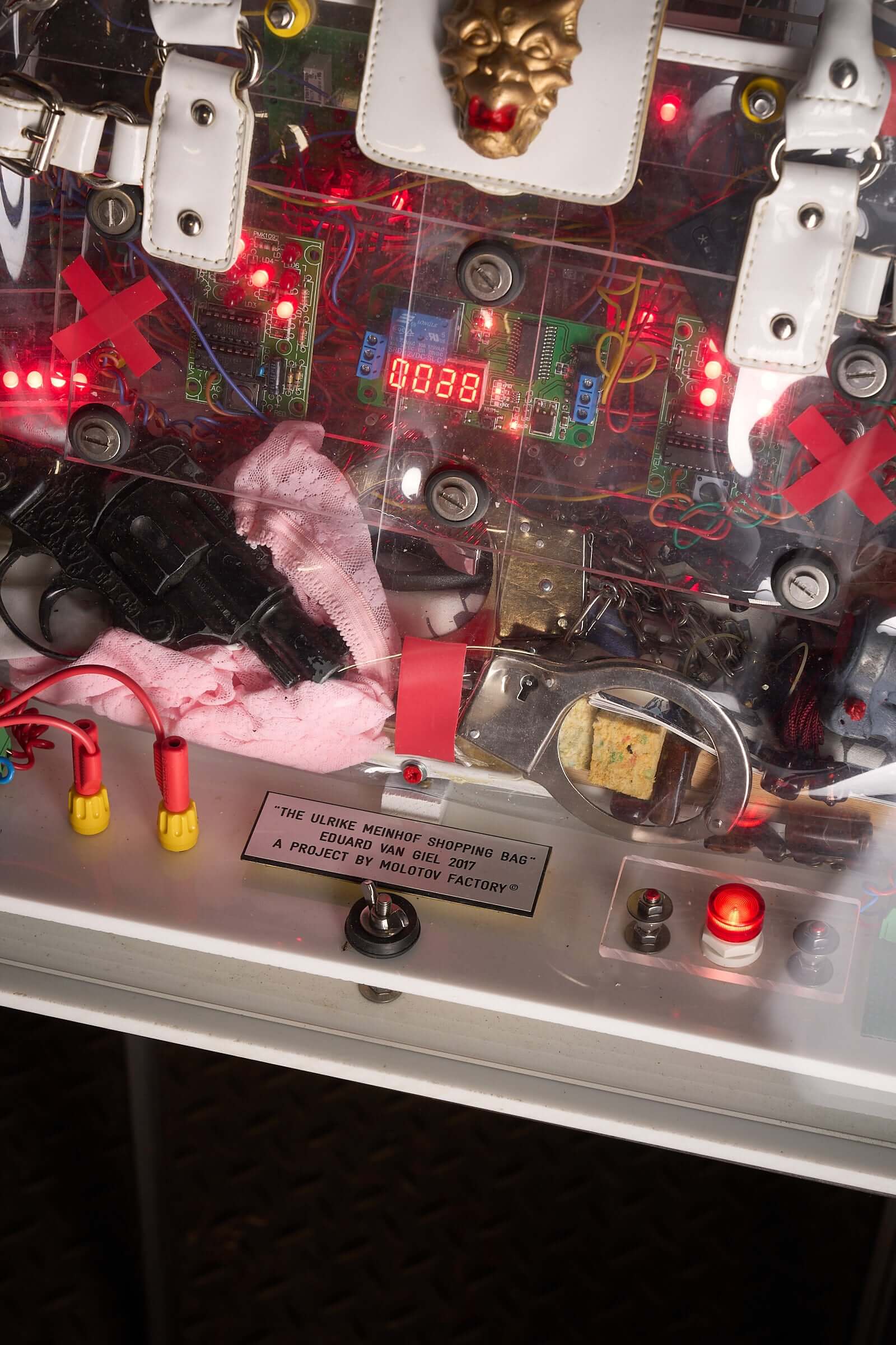 The Ulrike Meinhof Shopping Bag Installation by Eduard Van Giel (2017) featuring mixed-media elements and interactive components.
