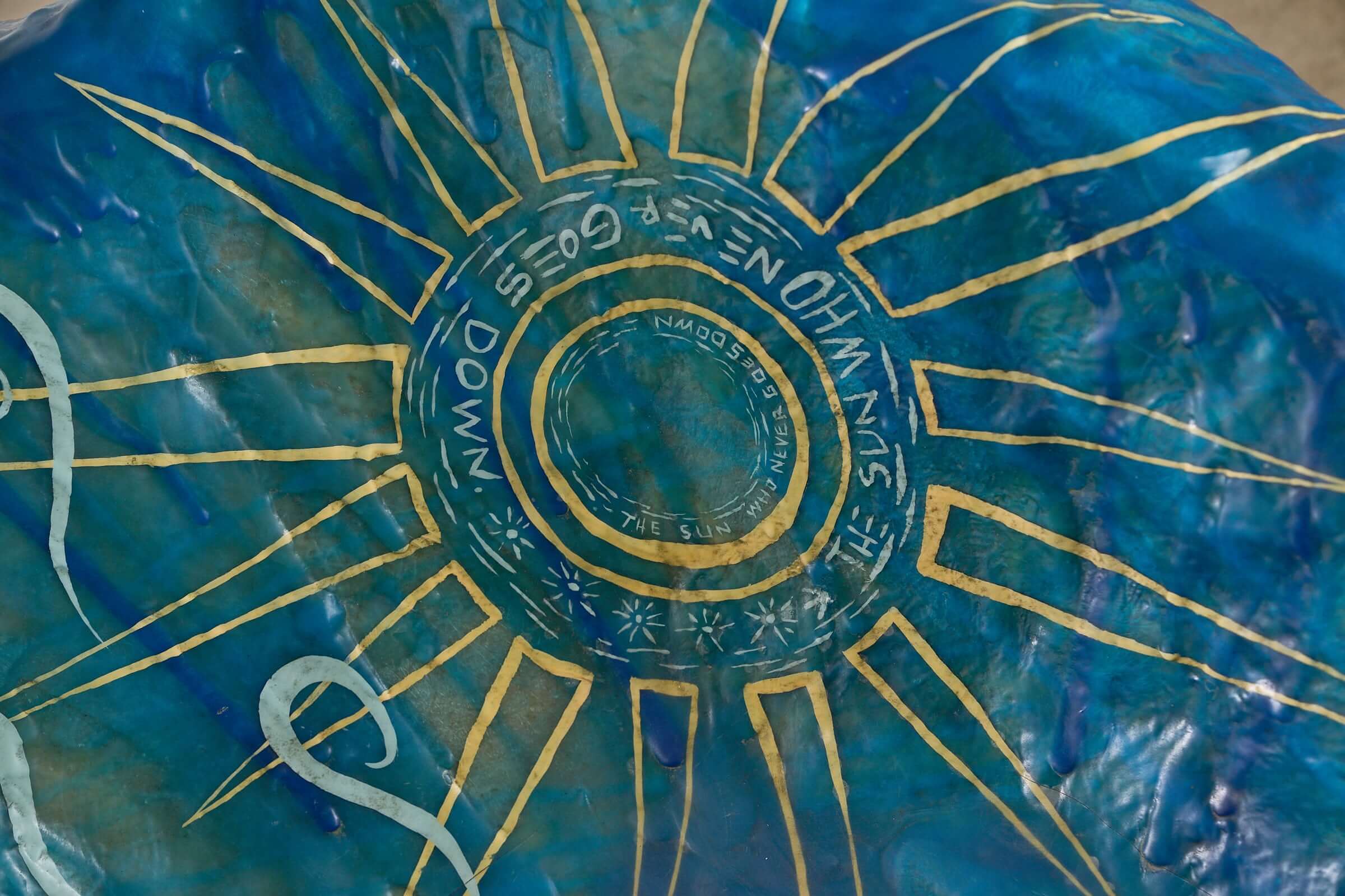 Close-up view of the decorative design on "The Sun Who Never Goes Down" Polyester Chair by Arne Quinze, 1971.