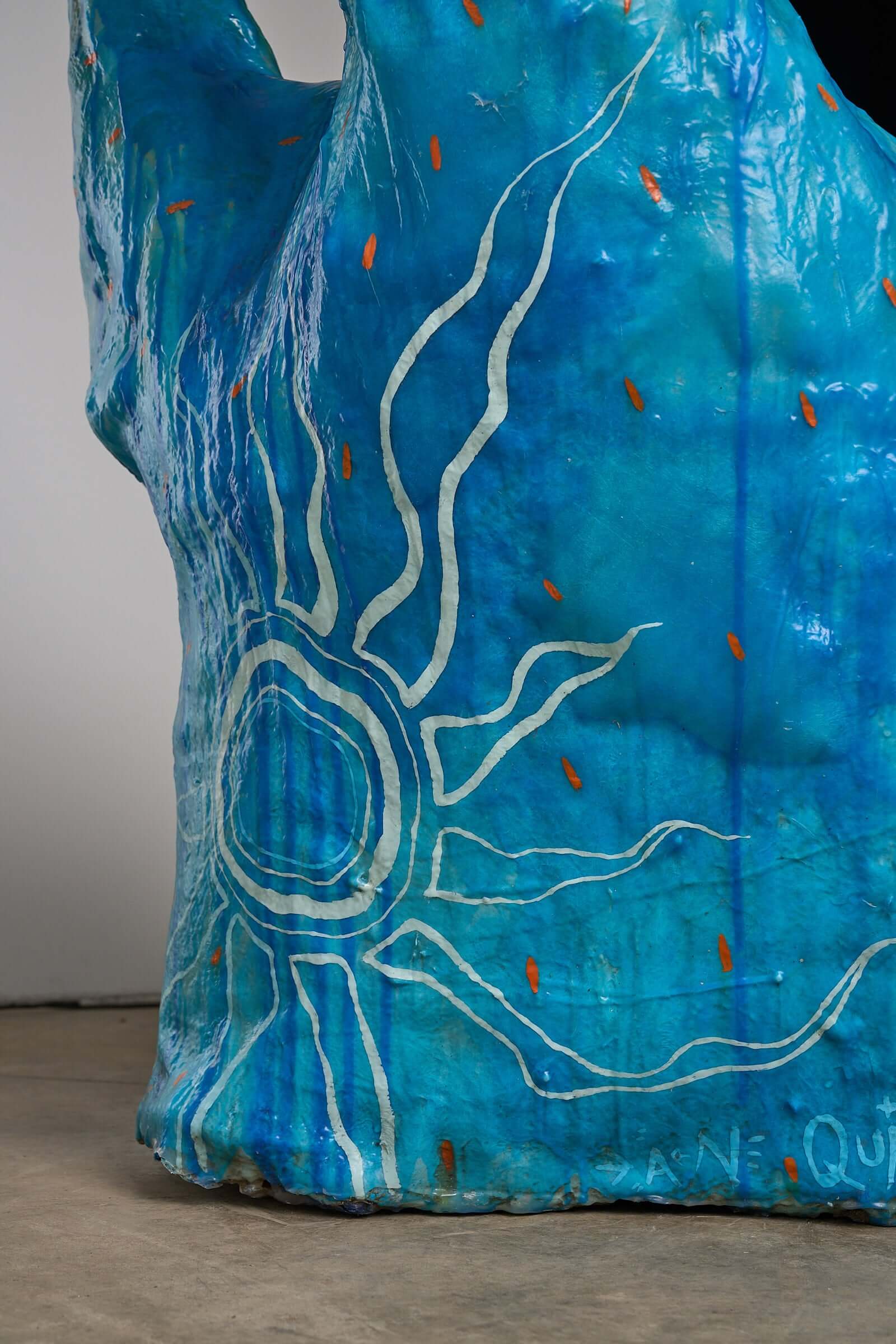 Close-up of the unique design on 'The Sun Who Never Goes Down' Polyester Chair by Arne Quinze, 1971, featuring a sun motif.