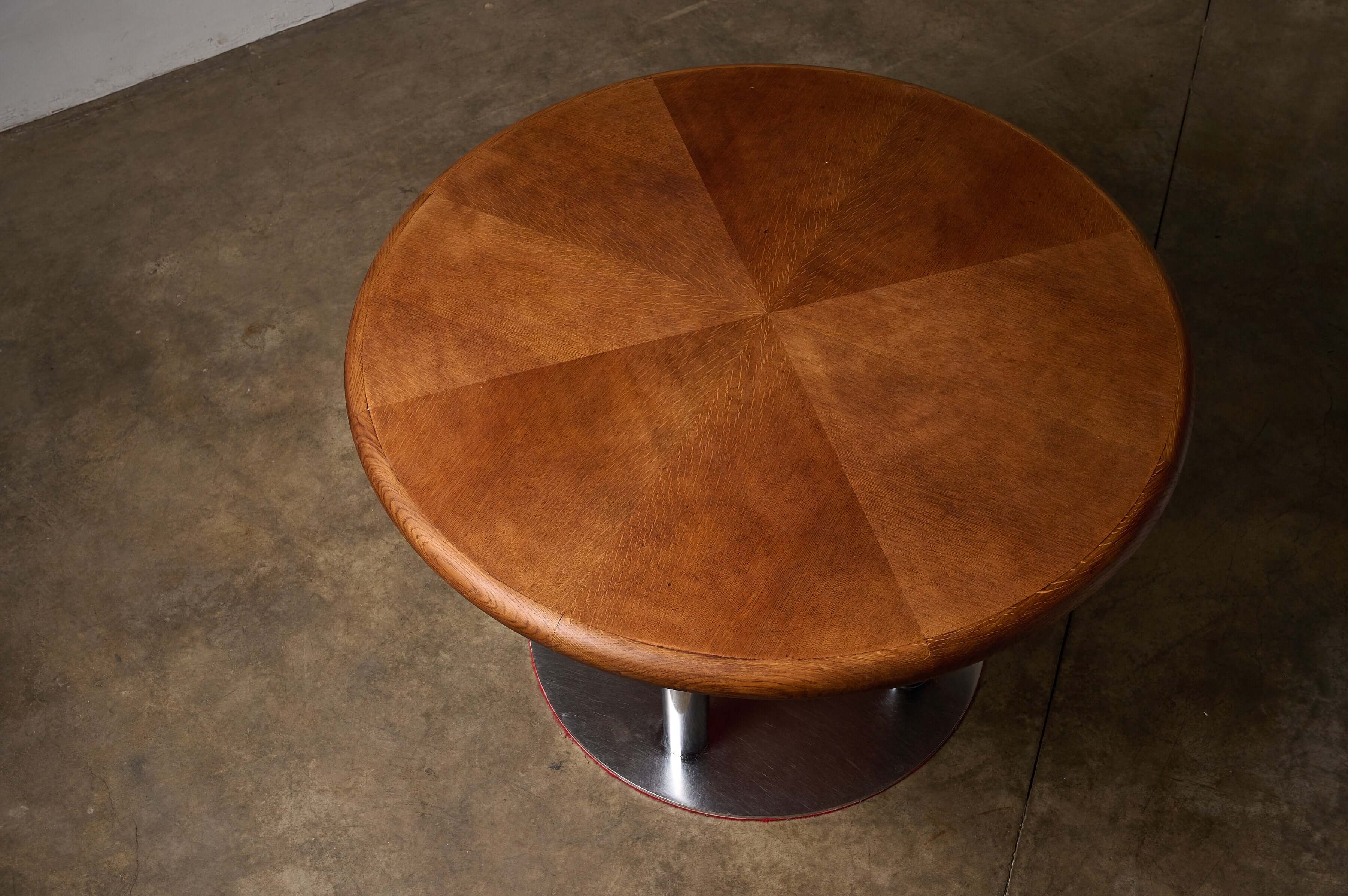 Round 1970s Dining Table with Chrome Pillar Base showcasing a circular wooden top and chrome base.