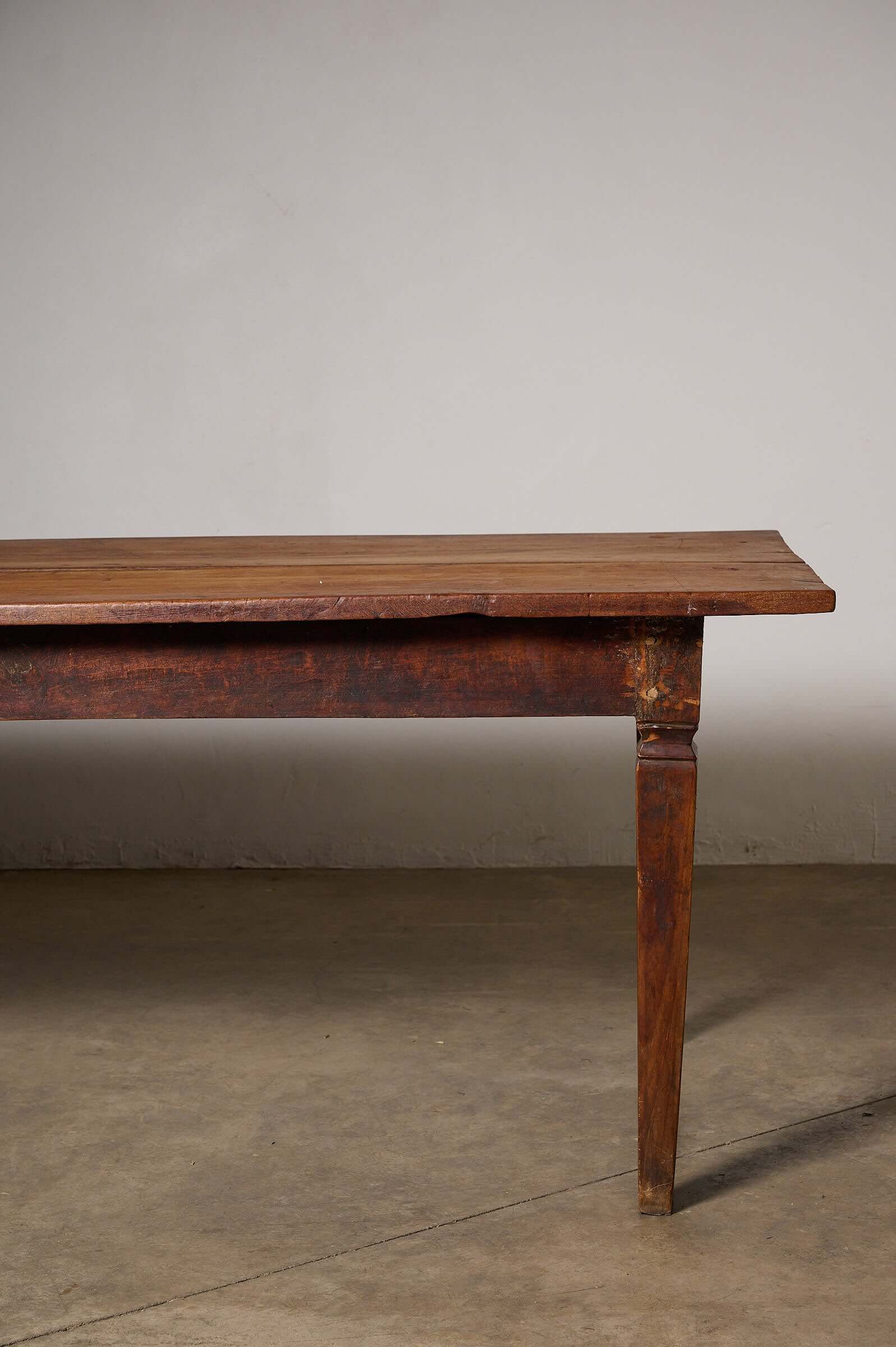 Rustic Tapered Leg Kitchen Dining Table showcasing a solid plank top and elegant tapered square leg design.