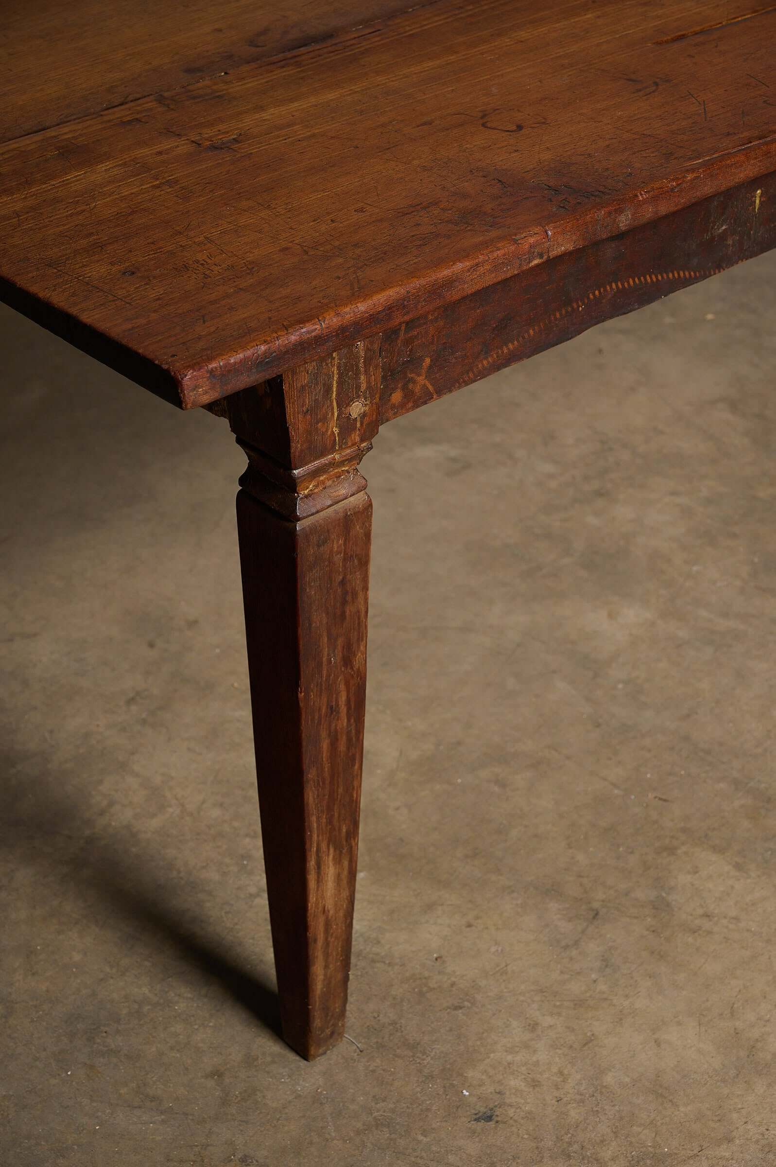 Rustic Tapered Leg Kitchen Dining Table with a solid plank top and elegant tapered square legs.