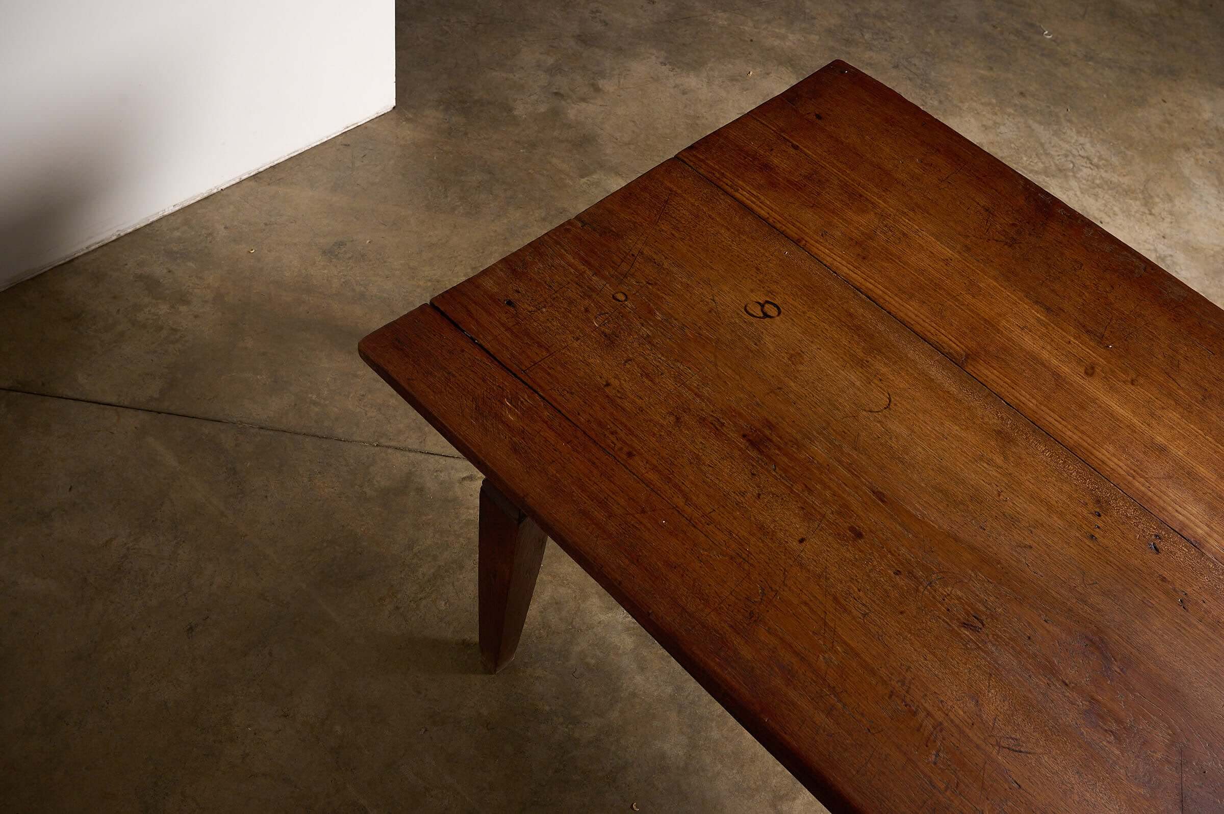 Rustic Tapered Leg Kitchen Dining Table with a solid plank top and elegant tapered legs, showcasing antique character.
