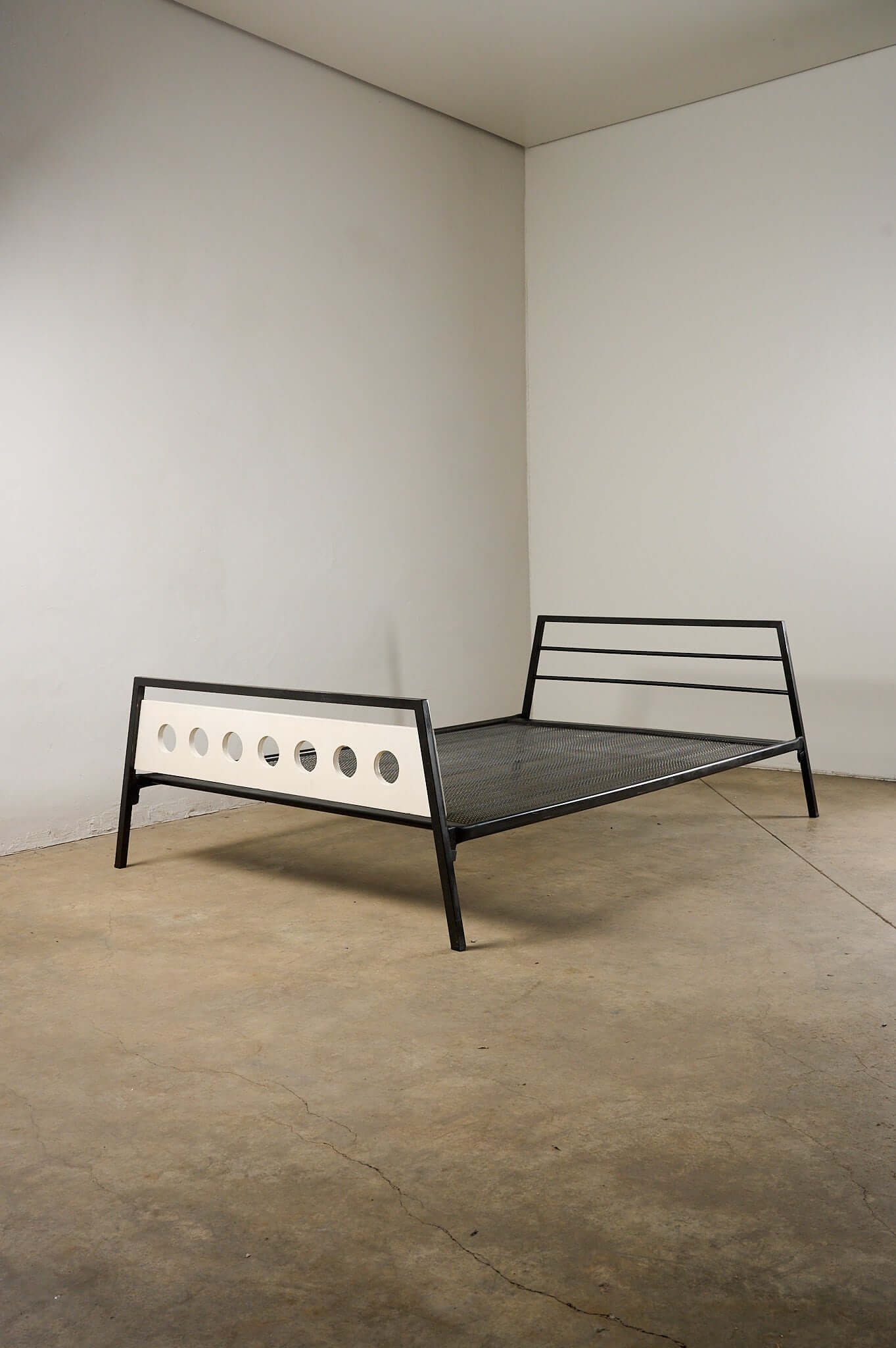Rob Parry & Emile Truijen 'Kamer 56' Bed for Dico Dico with black metal frame and off-white porthole panel.