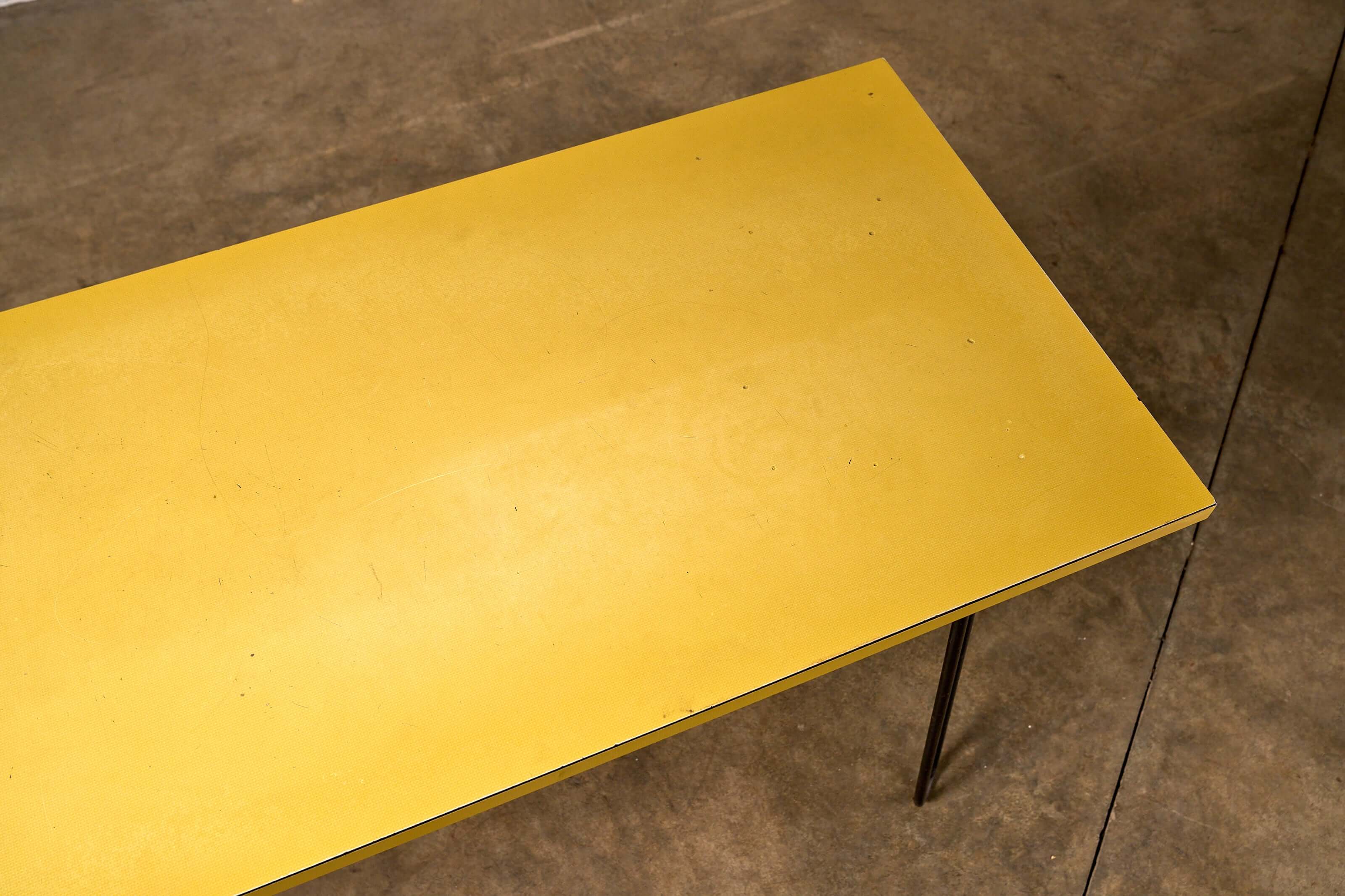 Mid-Century Yellow Console or Desk with textured yellow laminate top and black metal hairpin legs.