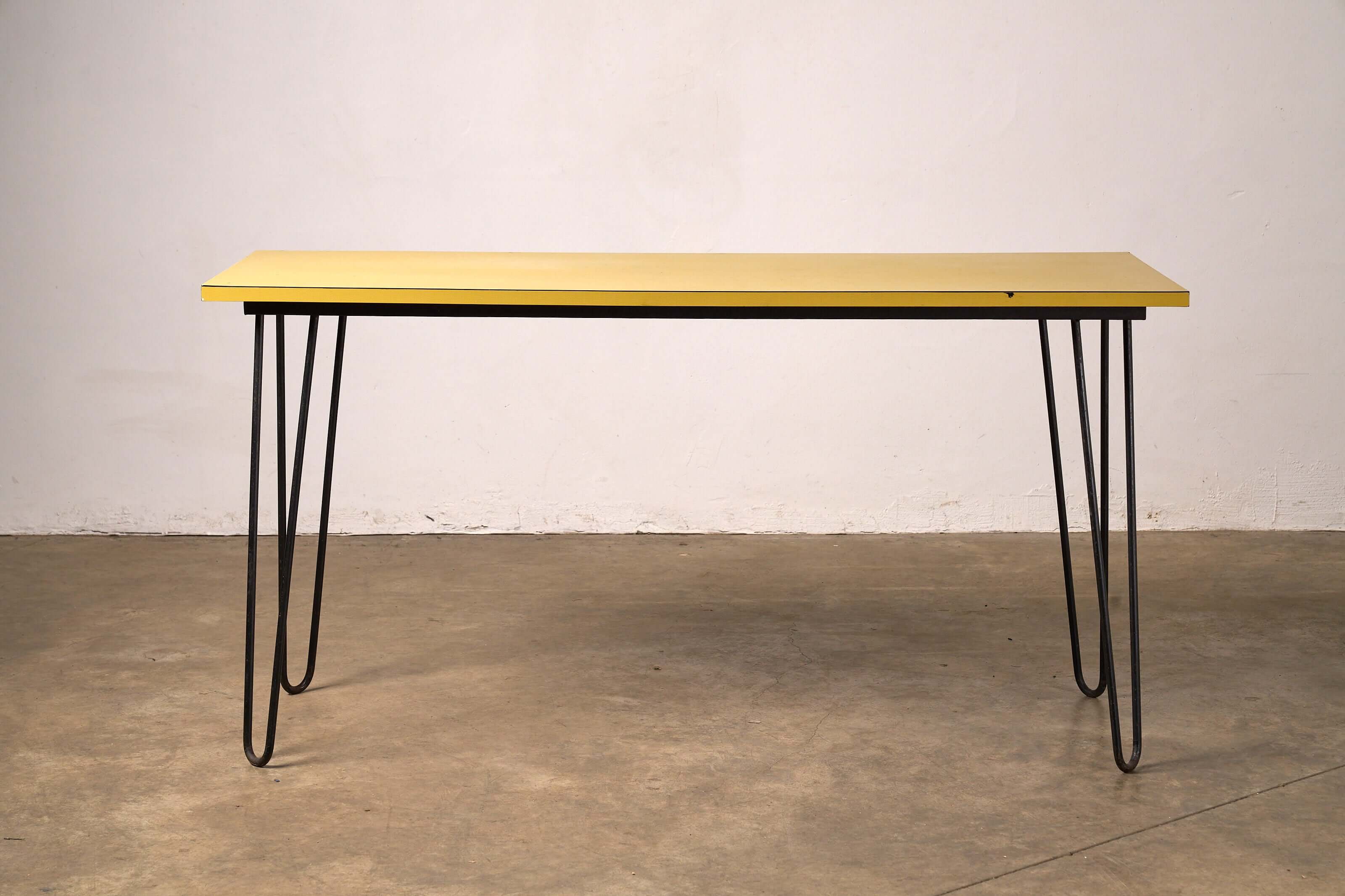 Mid-Century Yellow Console or Desk with textured yellow laminate top and black metal hairpin legs.