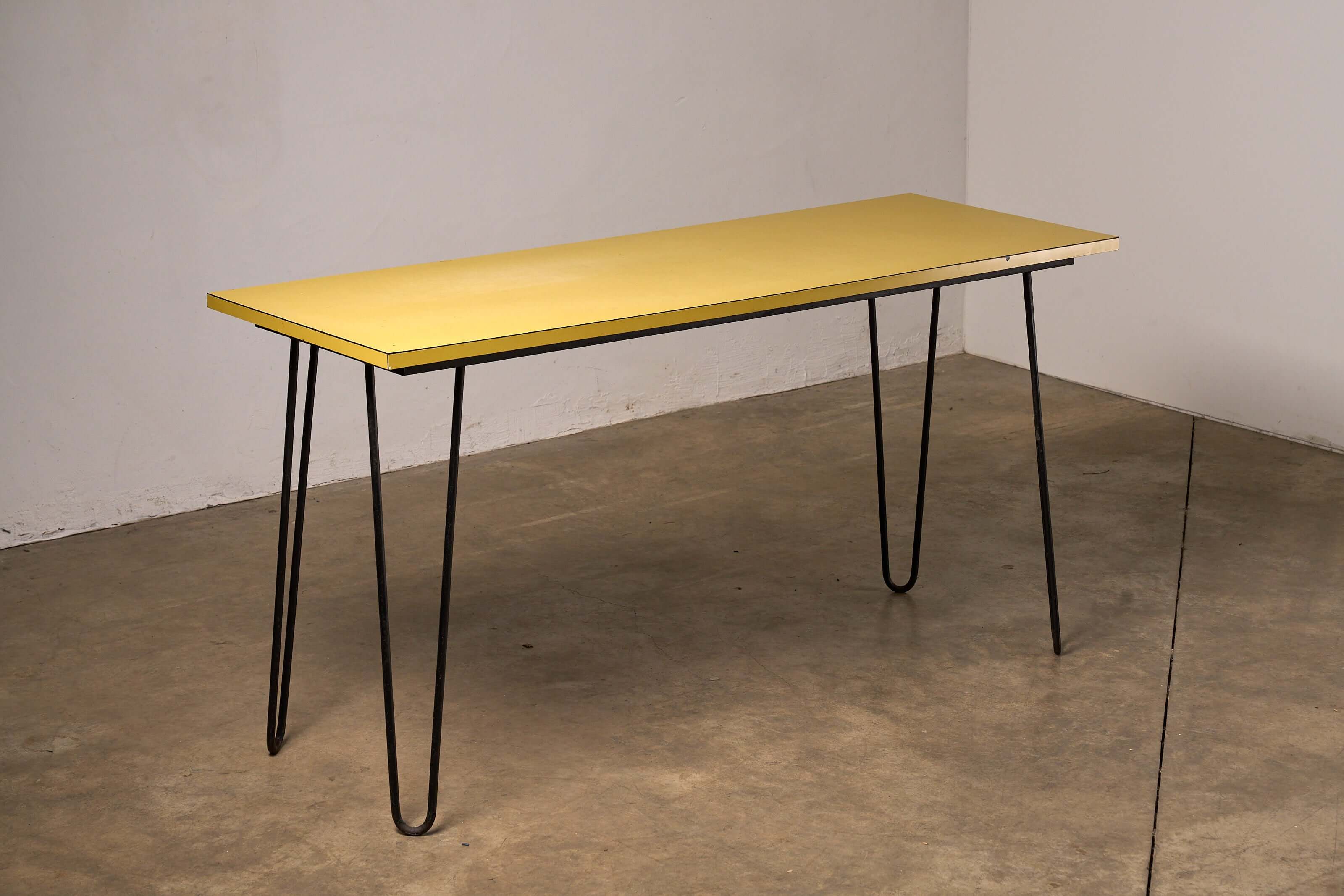 Mid-Century Yellow Console or Desk with textured yellow laminate top and black hairpin legs.