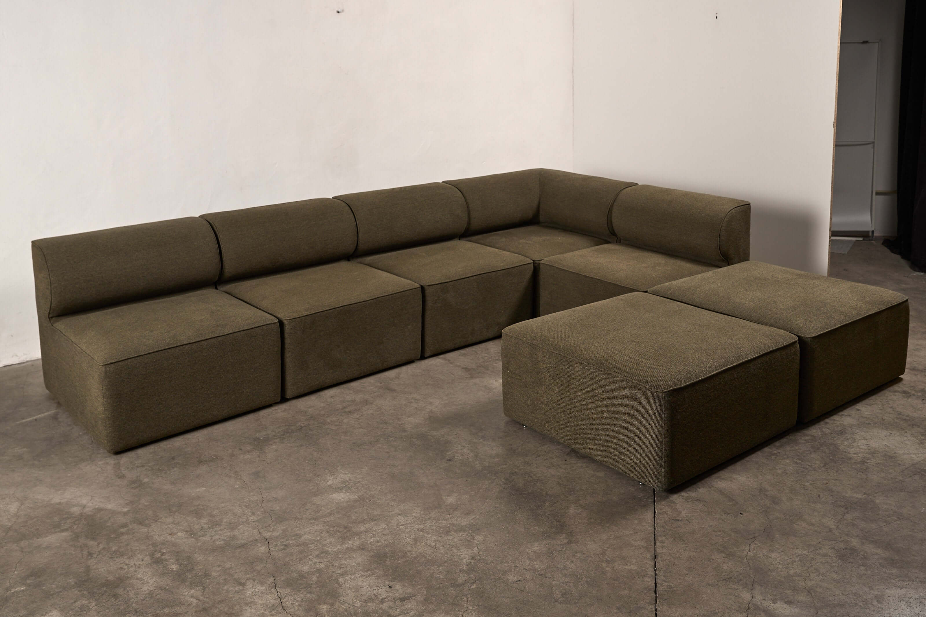 Eave Modular Sofa by Norm Architects in Grey Green, featuring a contemporary design and generous proportions.