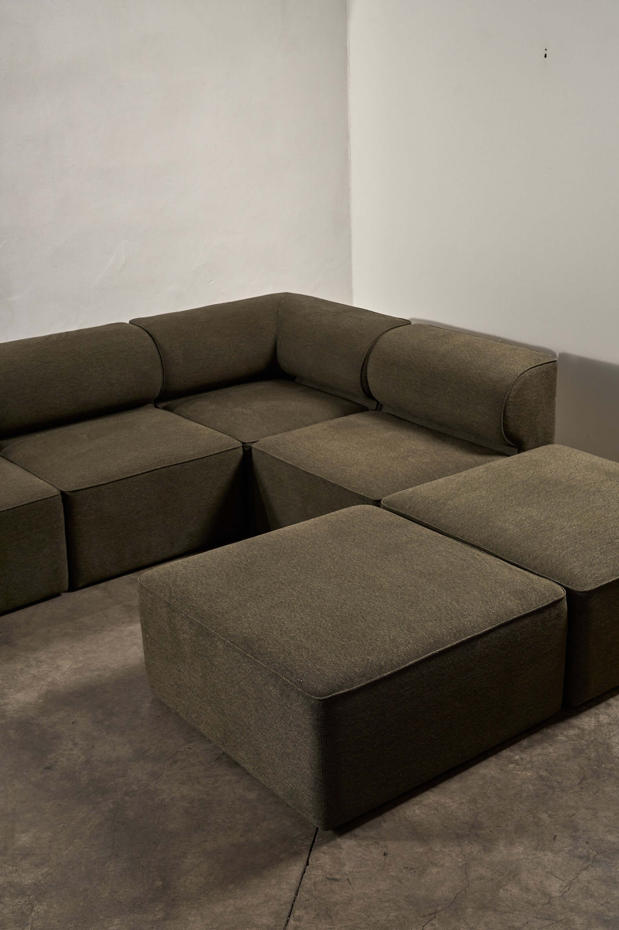 Eave Modular Sofa by Norm Architects in Grey Green with curved profile and generous proportions.