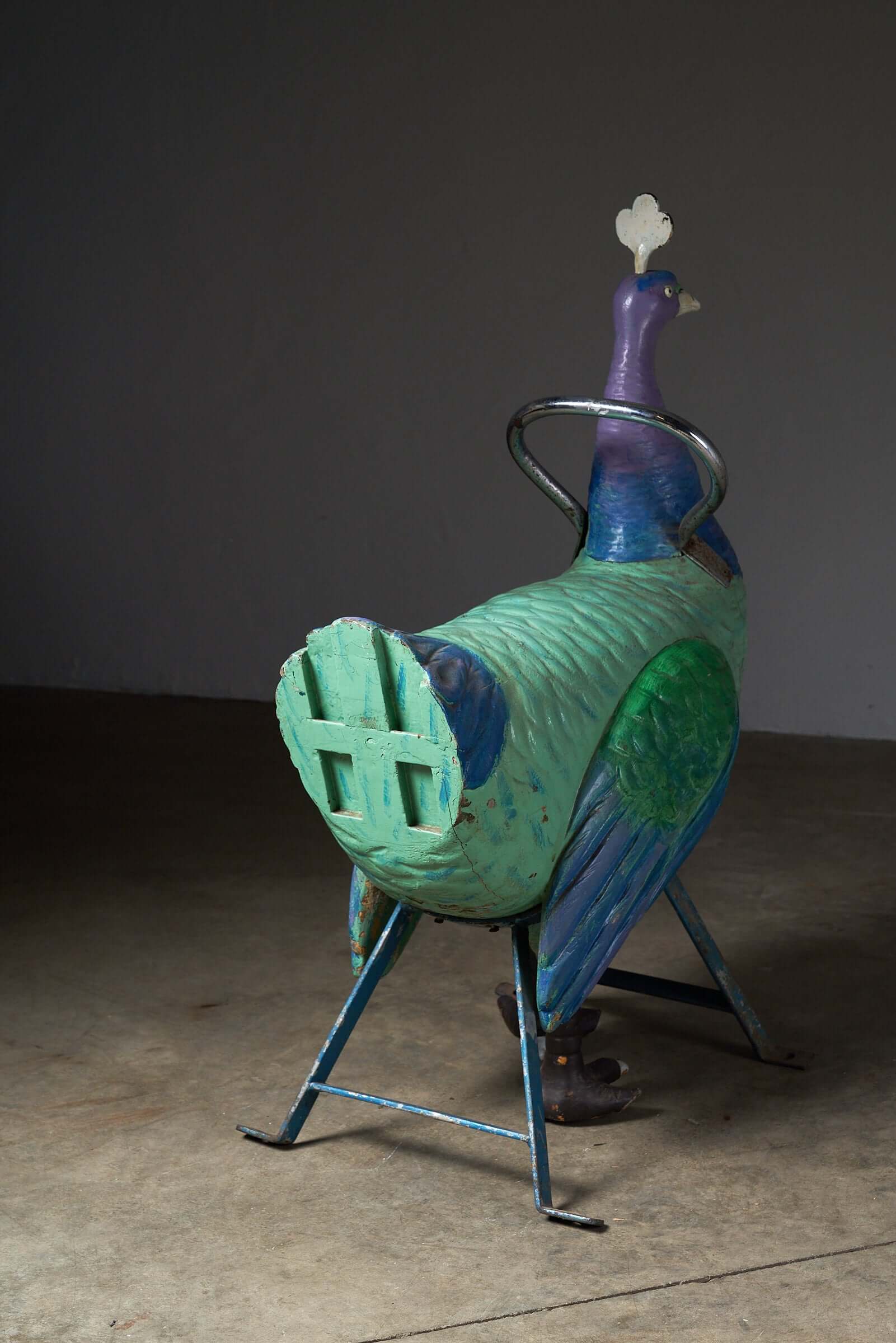 Antique Carnival Ride Peacock Sculpture, hand-carved wooden carousel figure with vibrant painted finishes.