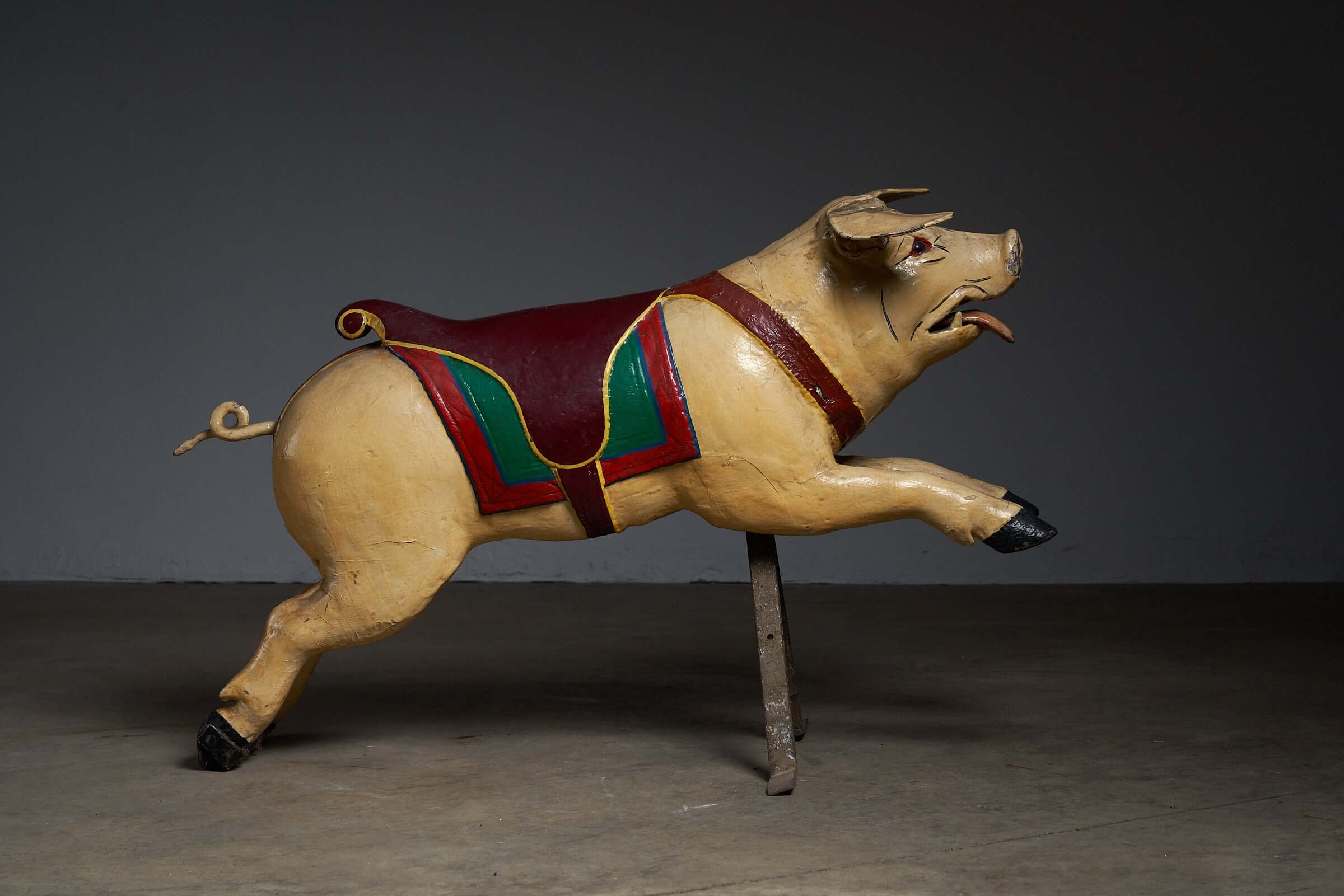 Carved Wooden Carousel Pig Figure featuring a hand-carved pig with painted saddle and metal support.